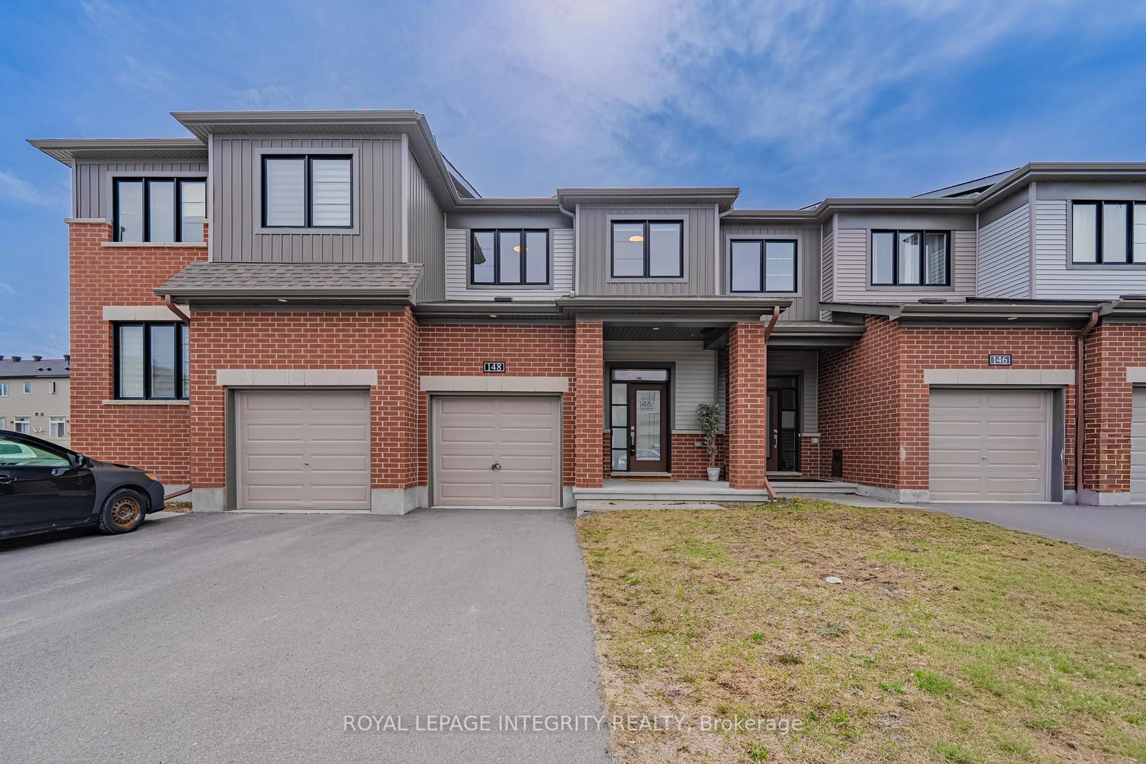 Home with brick exterior material, street for 148 Namaste Walk, Ottawa Ontario K2J 6Z4