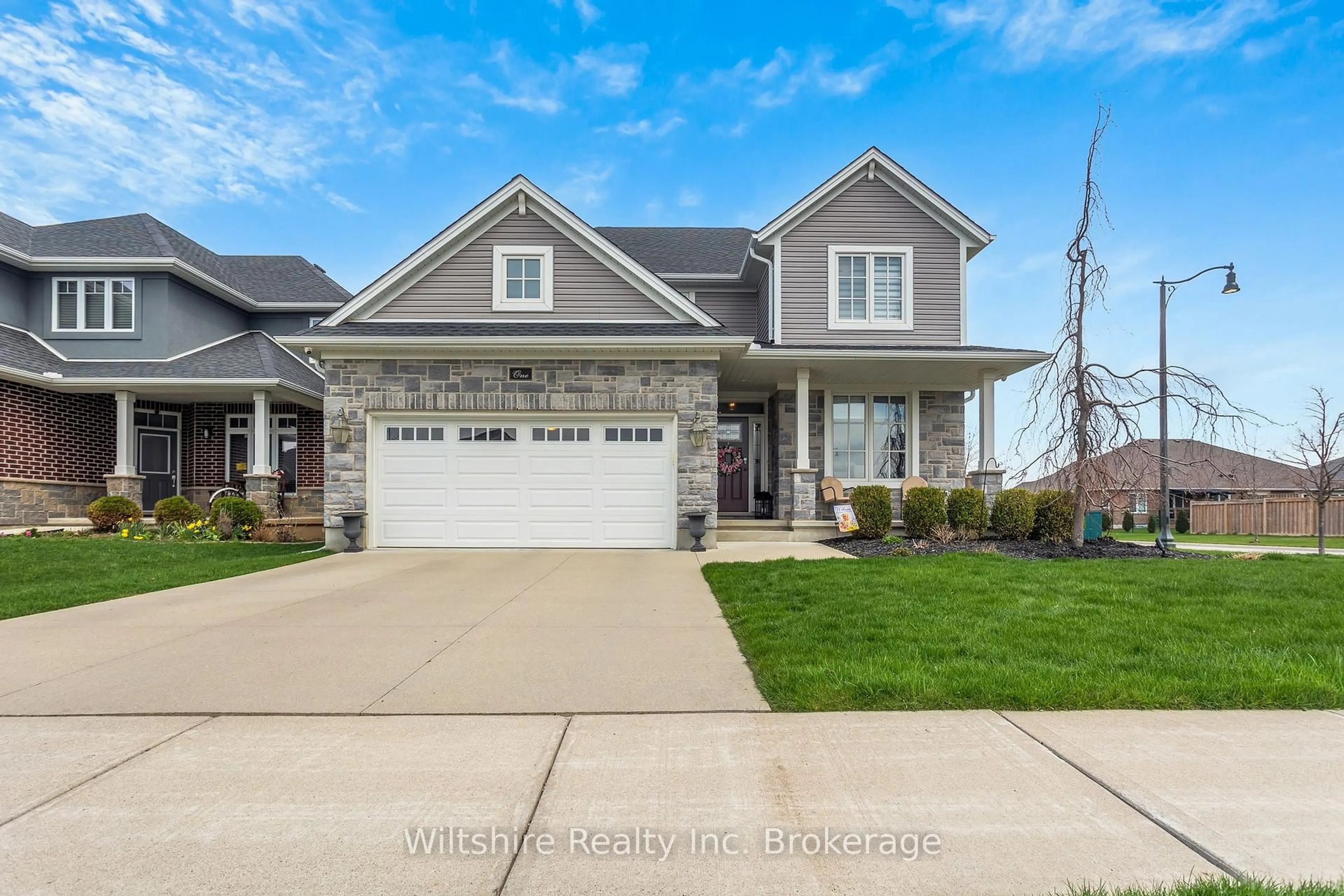 Home with vinyl exterior material, street for 1 Honey Bend, St. Thomas Ontario N5P 3S6