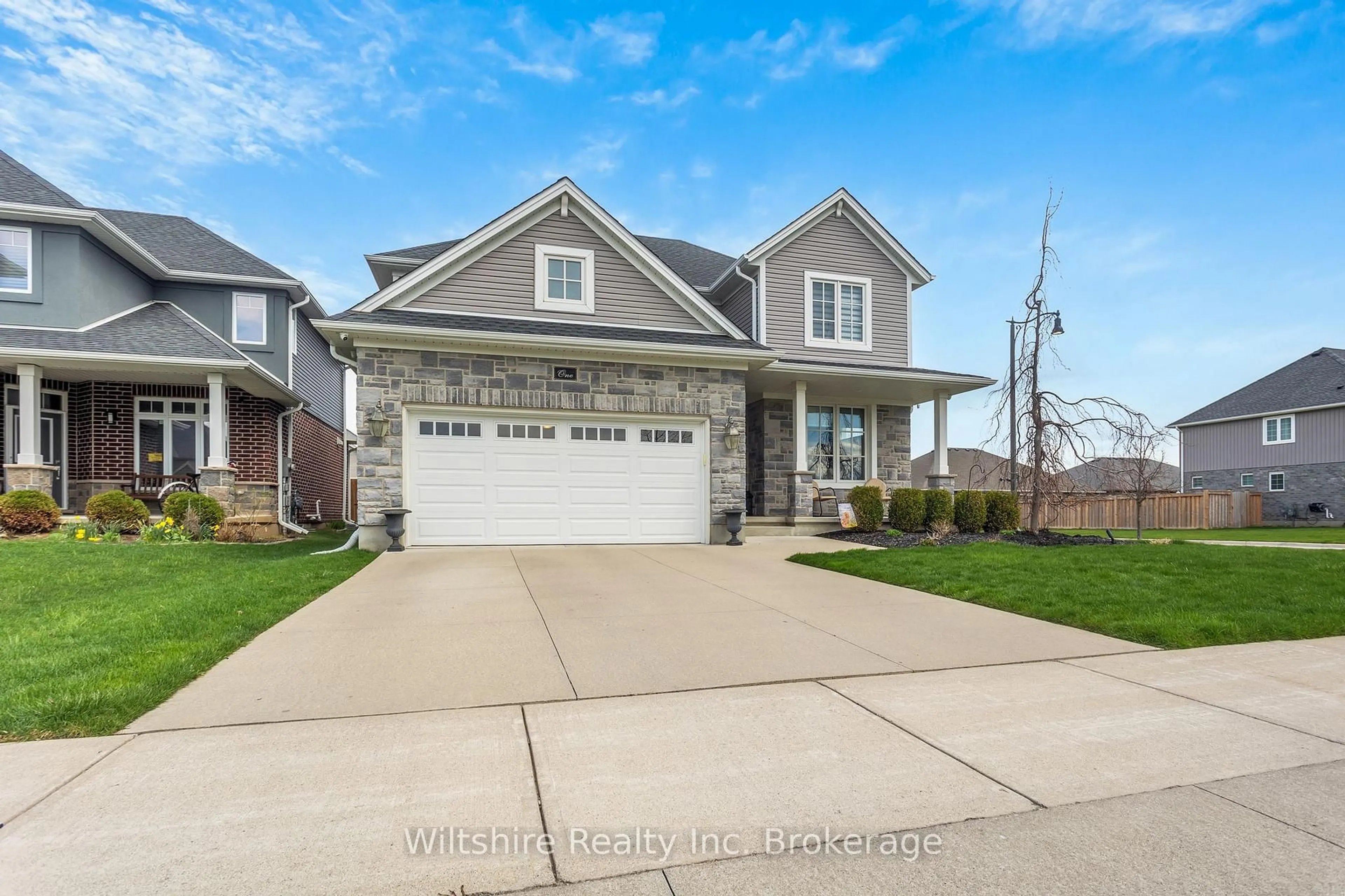 Home with vinyl exterior material, street for 1 Honey Bend, St. Thomas Ontario N5P 3S6