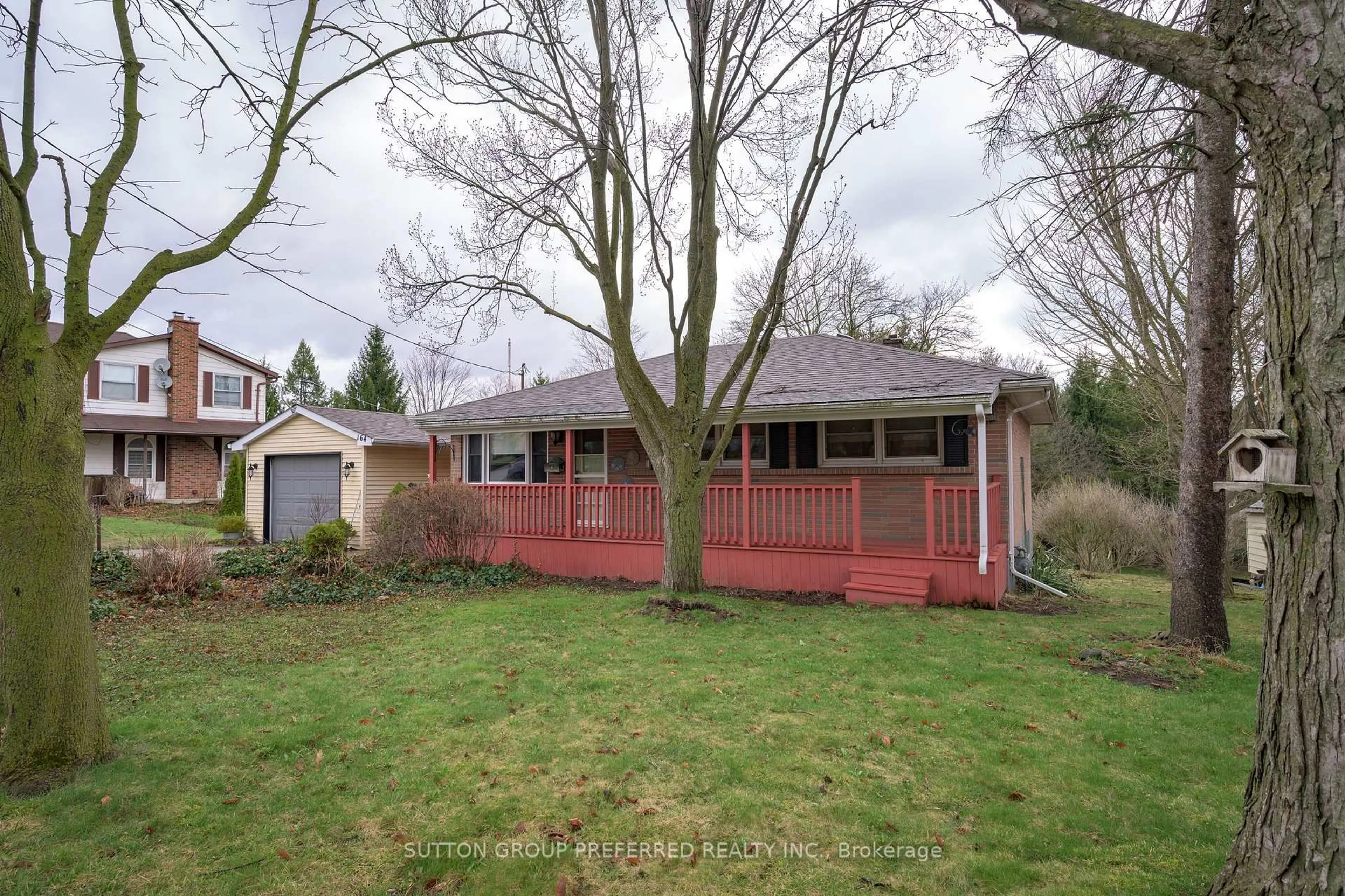 Home with vinyl exterior material, street for 164 McKeand St, Ingersoll Ontario N5C 3H9