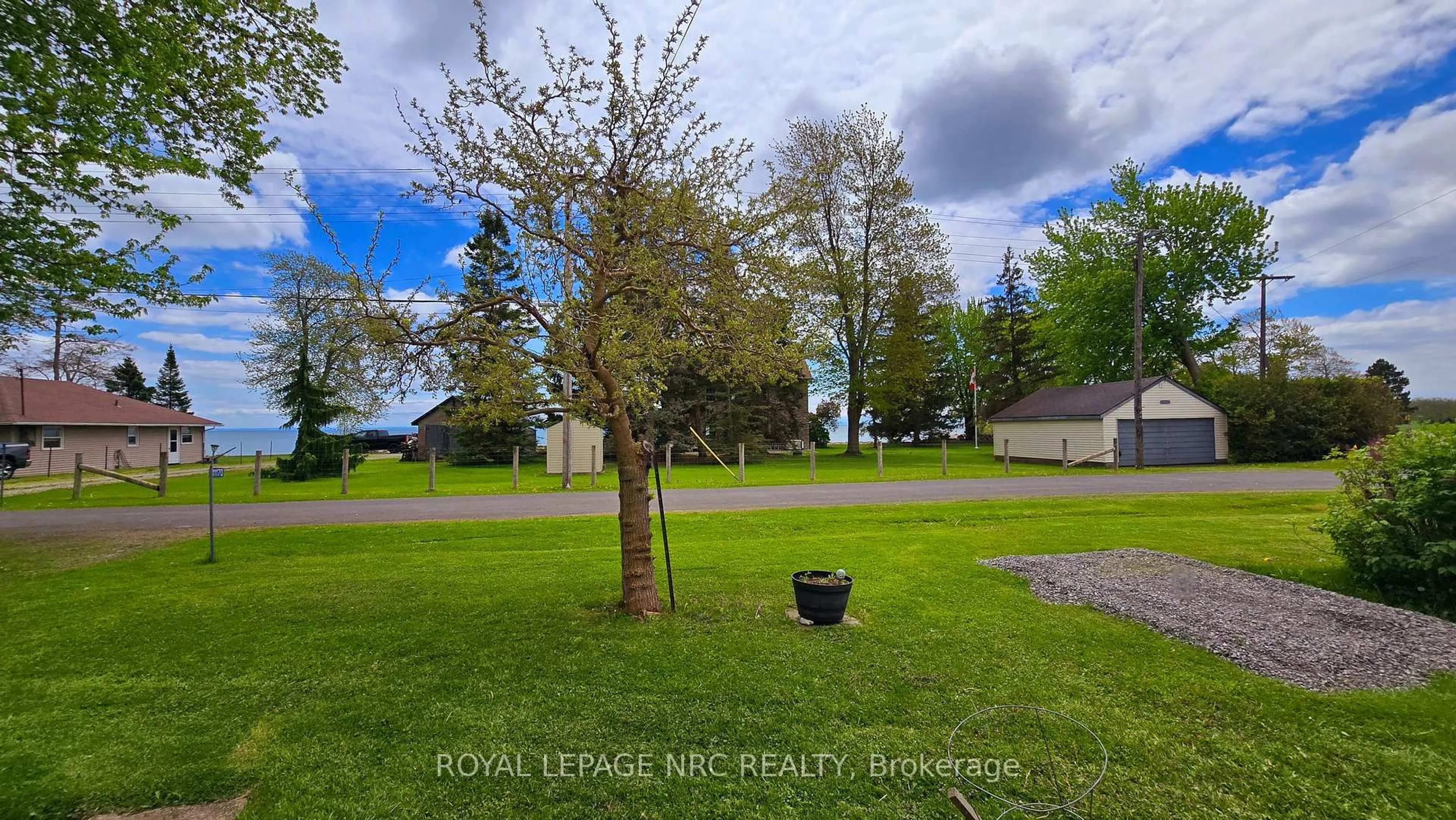 A pic from outside/outdoor area/front of a property/back of a property/a pic from drone, water/lake/river/ocean view for 11170 Churchill Ave, Wainfleet Ontario L3K 5V4