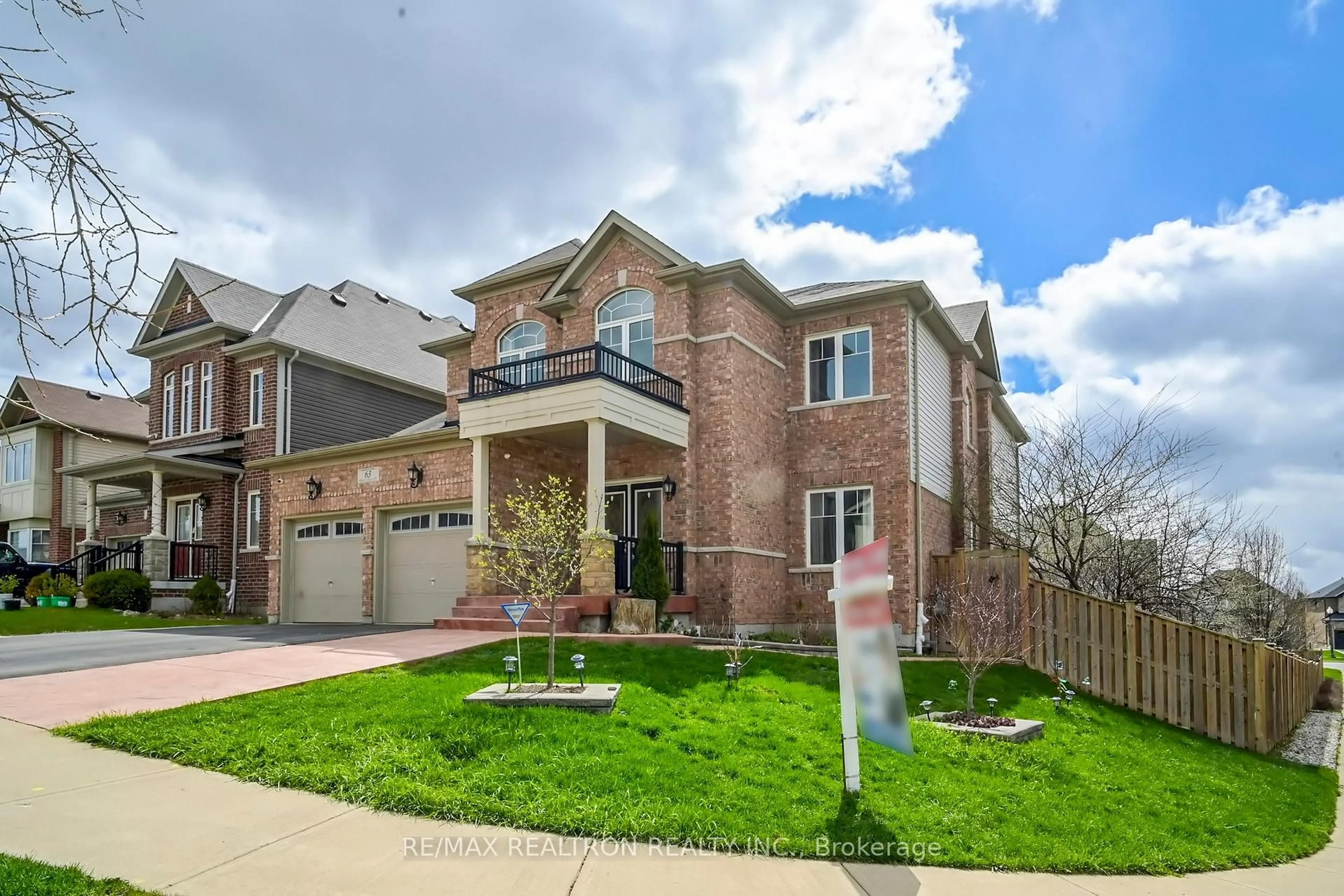 Home with brick exterior material, street for 63 Pieter Vos Dr, Kitchener Ontario N2P 0G2