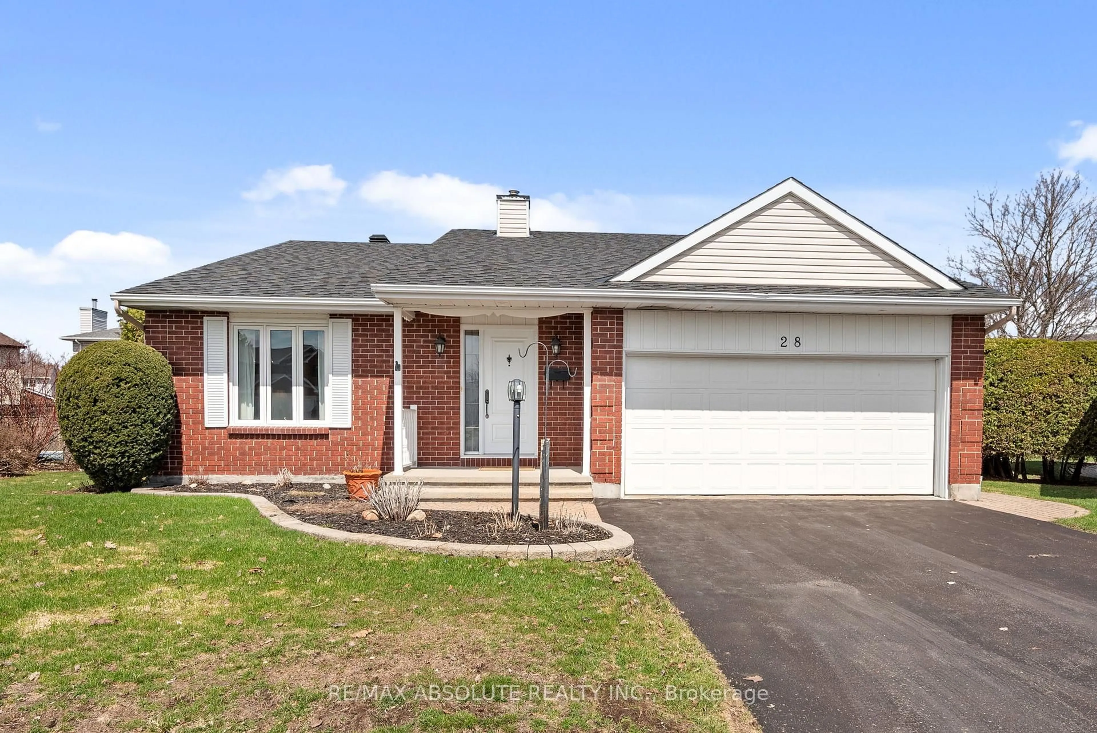 Home with brick exterior material, street for 28 Halley St, Barrhaven Ontario K2J 3W2