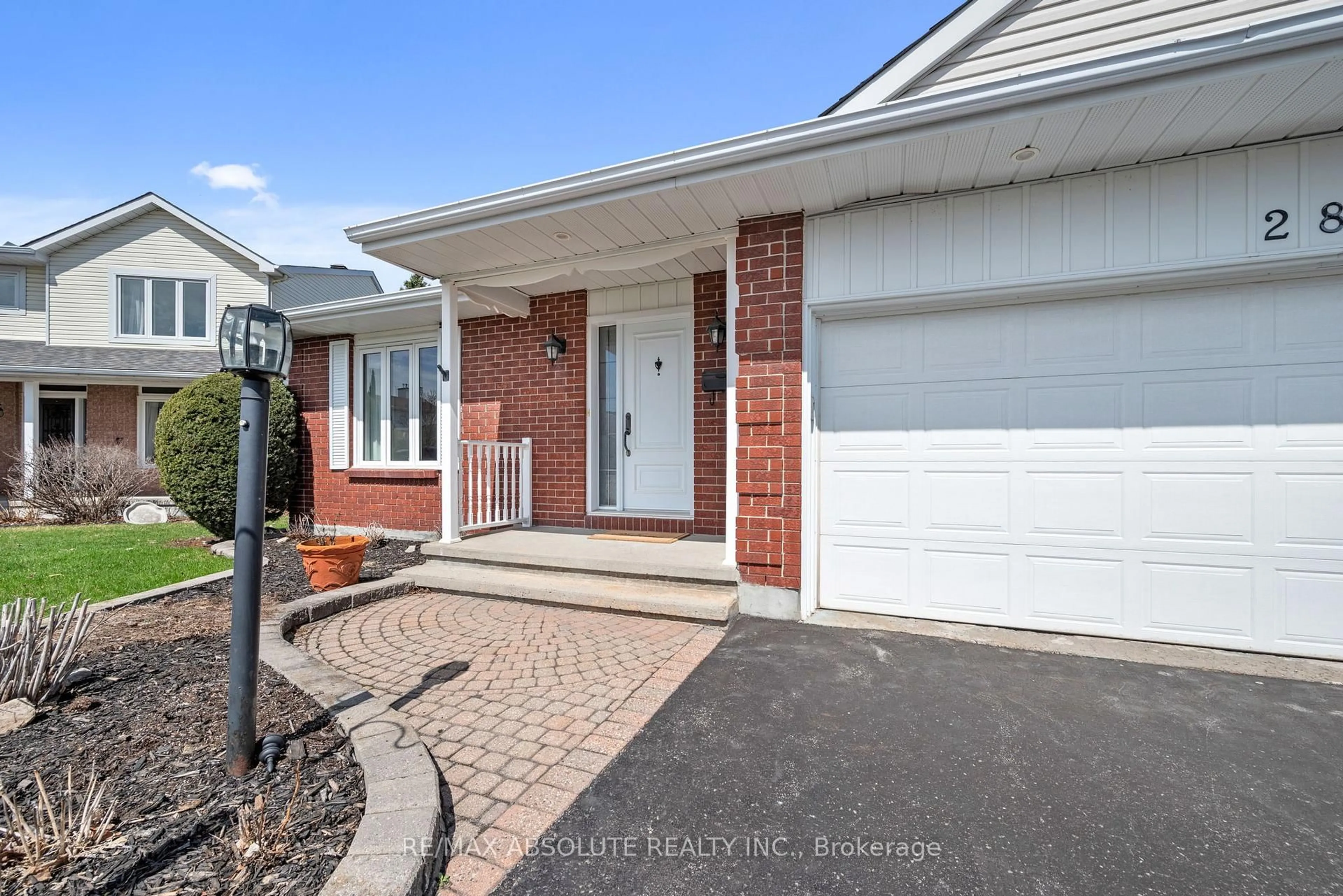 Home with brick exterior material, street for 28 Halley St, Barrhaven Ontario K2J 3W2
