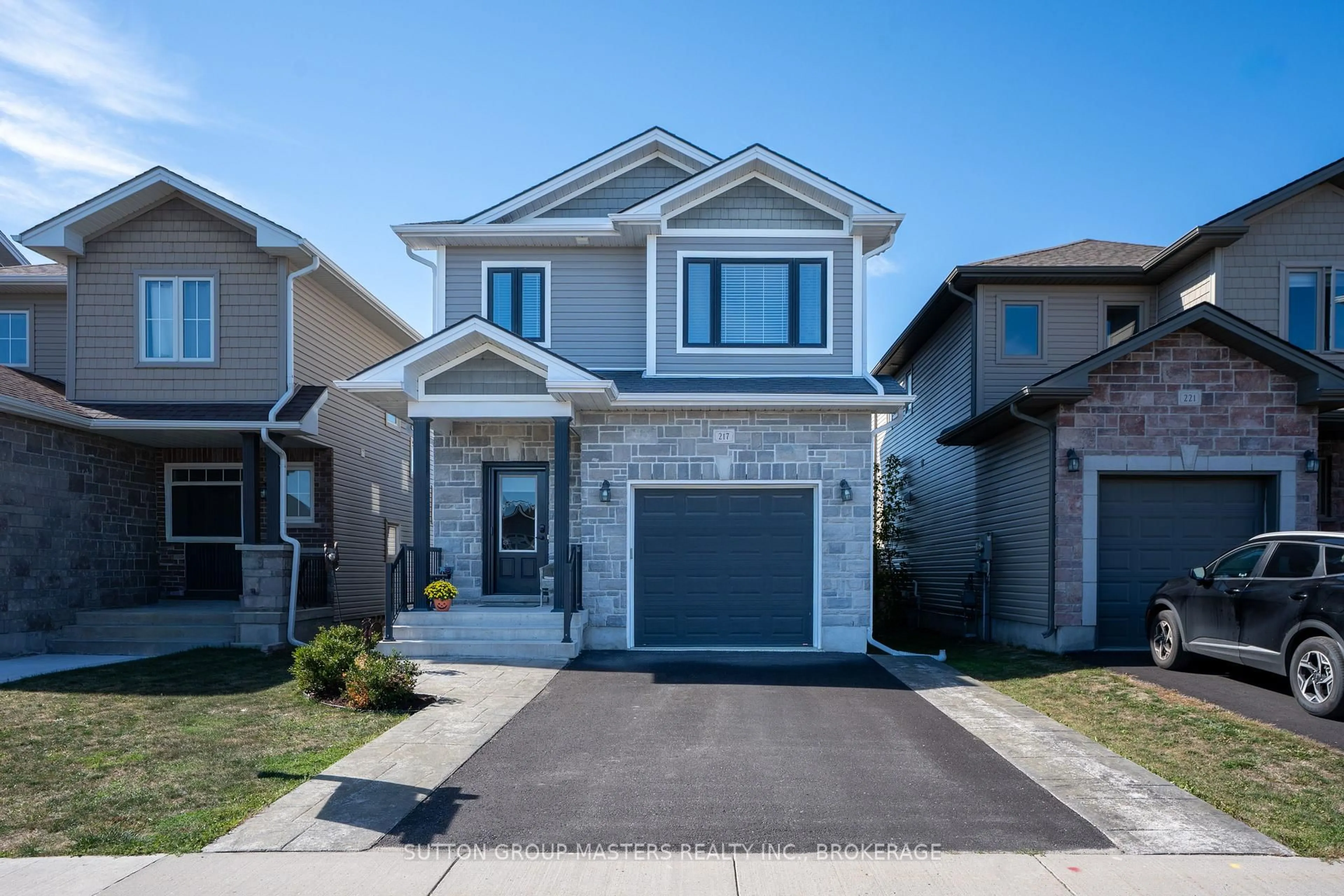 Home with vinyl exterior material, street for 217 Holden St, Kingston Ontario K7P 0L1