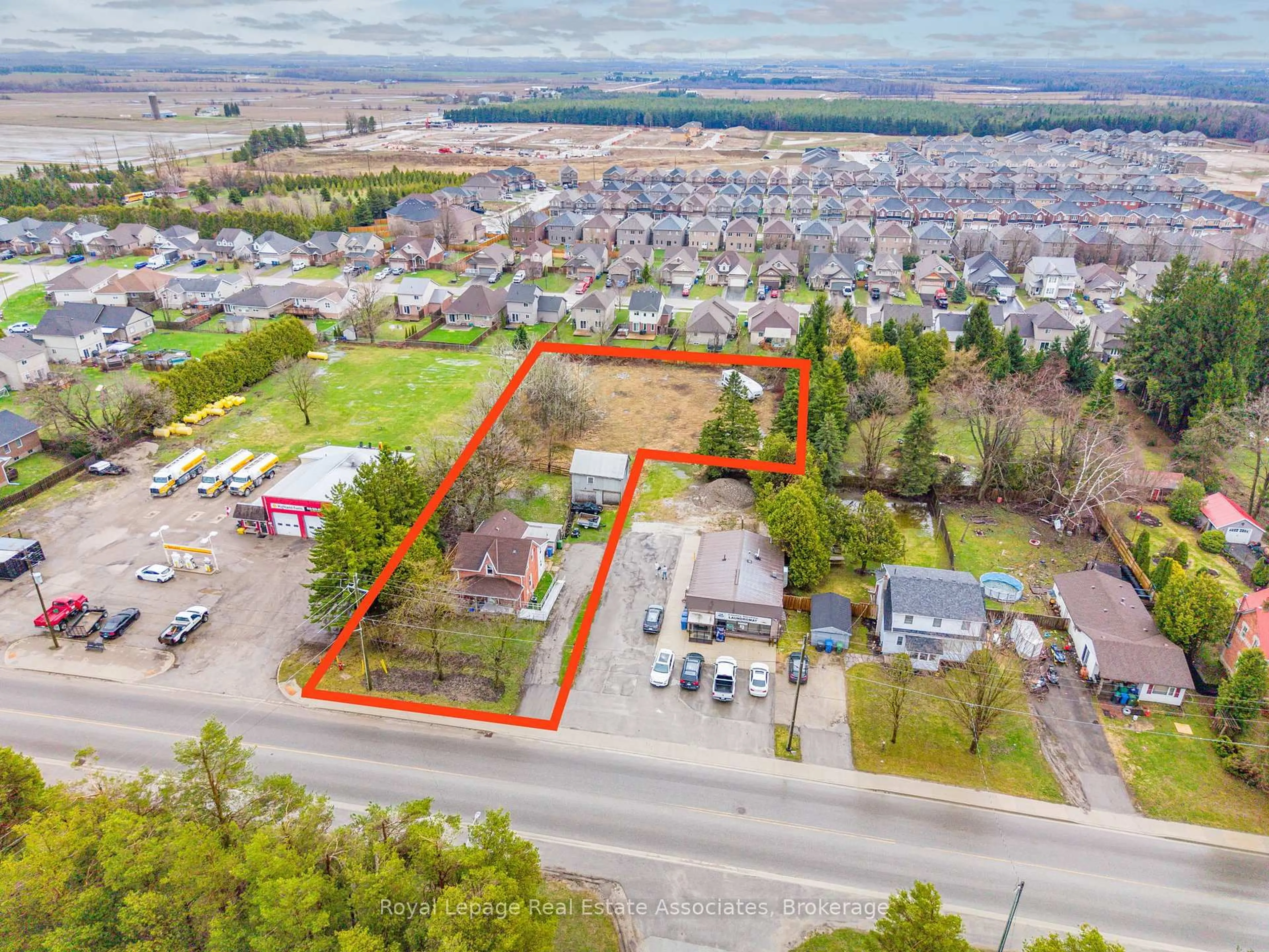 A pic from outside/outdoor area/front of a property/back of a property/a pic from drone, street for 557 Main St, Southgate Ontario N0C 1B0