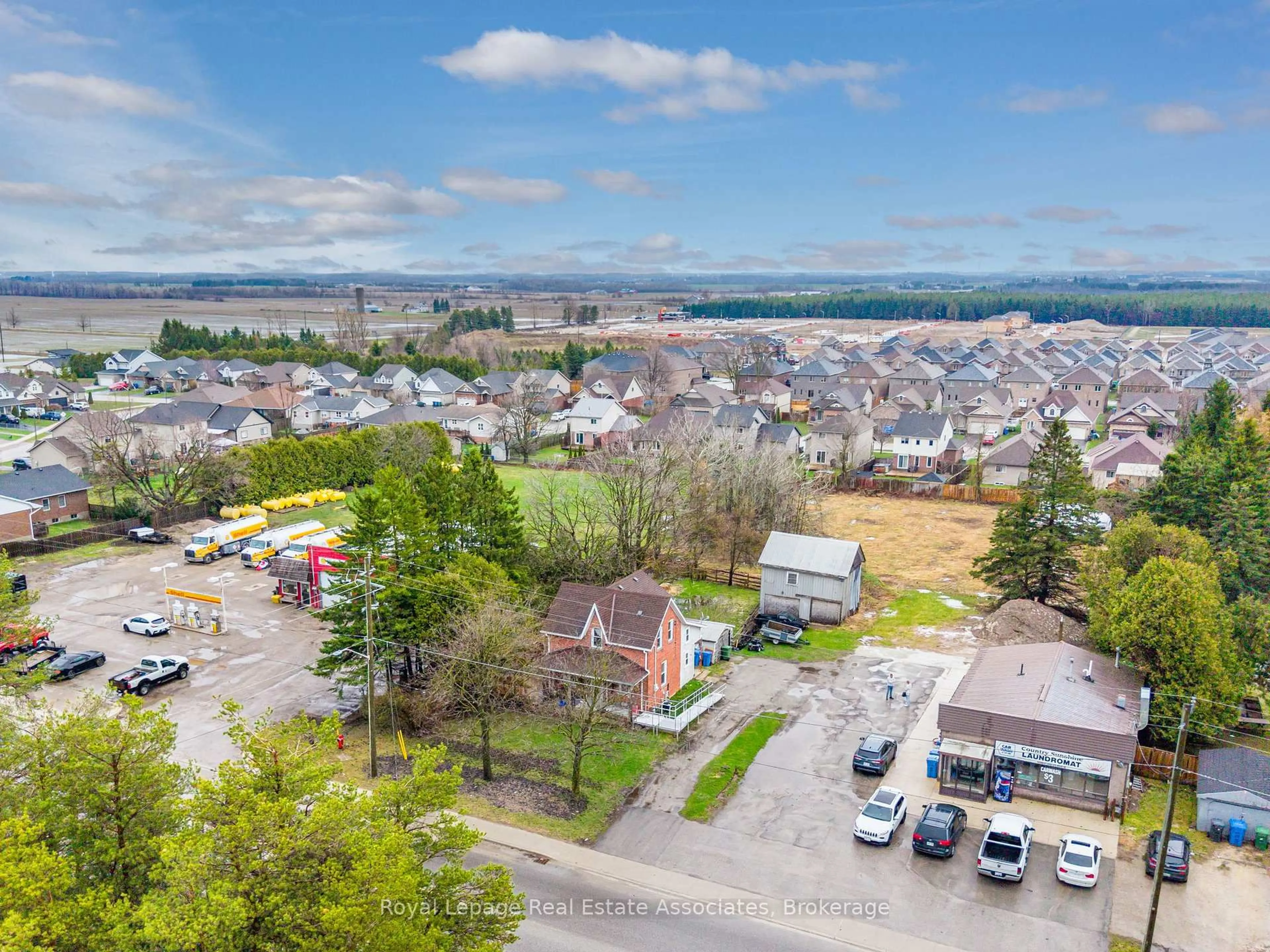 A pic from outside/outdoor area/front of a property/back of a property/a pic from drone, unknown for 557 Main St, Southgate Ontario N0C 1B0