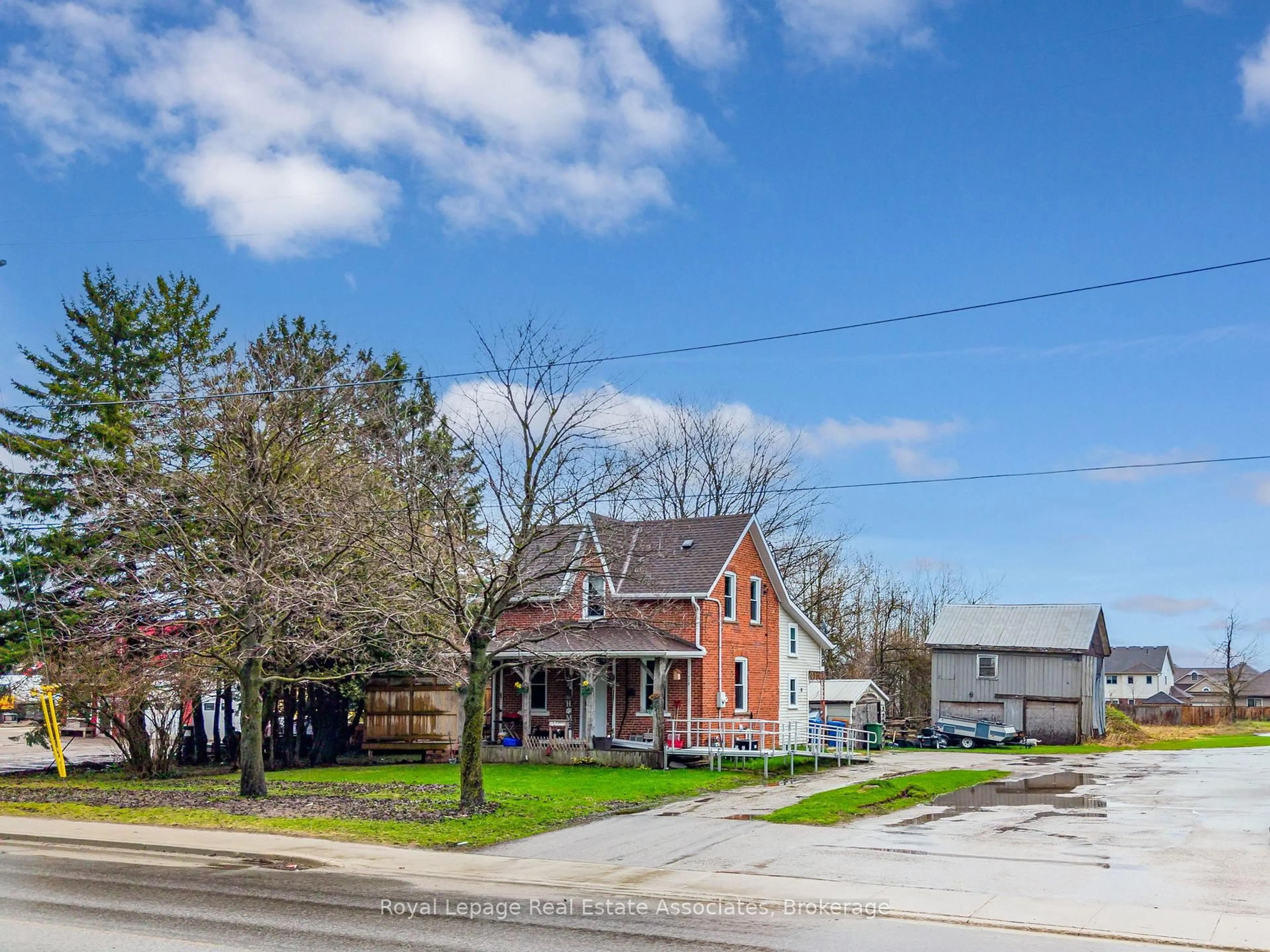A pic from outside/outdoor area/front of a property/back of a property/a pic from drone, street for 557 Main St, Southgate Ontario N0C 1B0