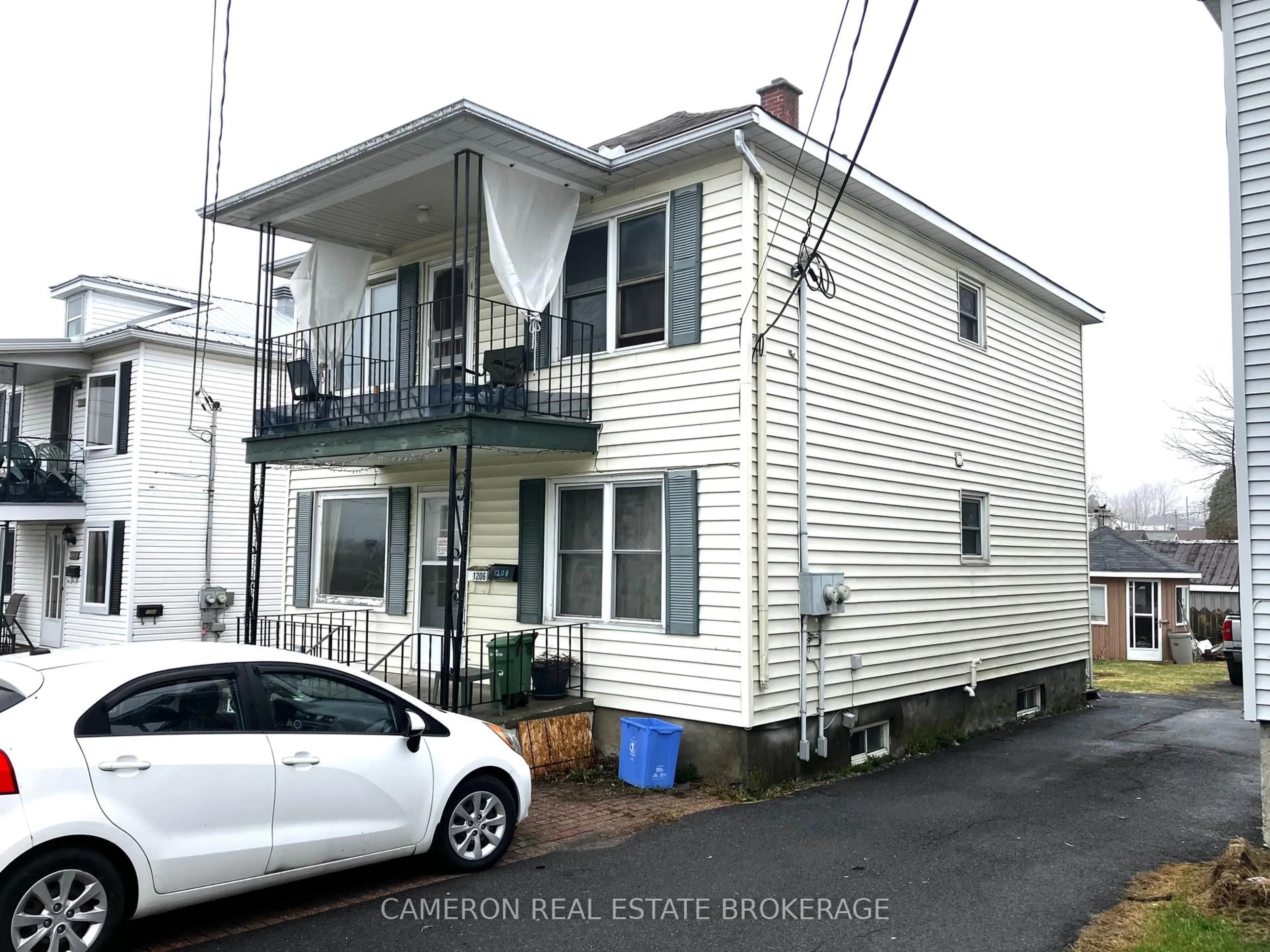 Home with vinyl exterior material, street for 1206-1208 Easton Ave, Cornwall Ontario K6H 1X4