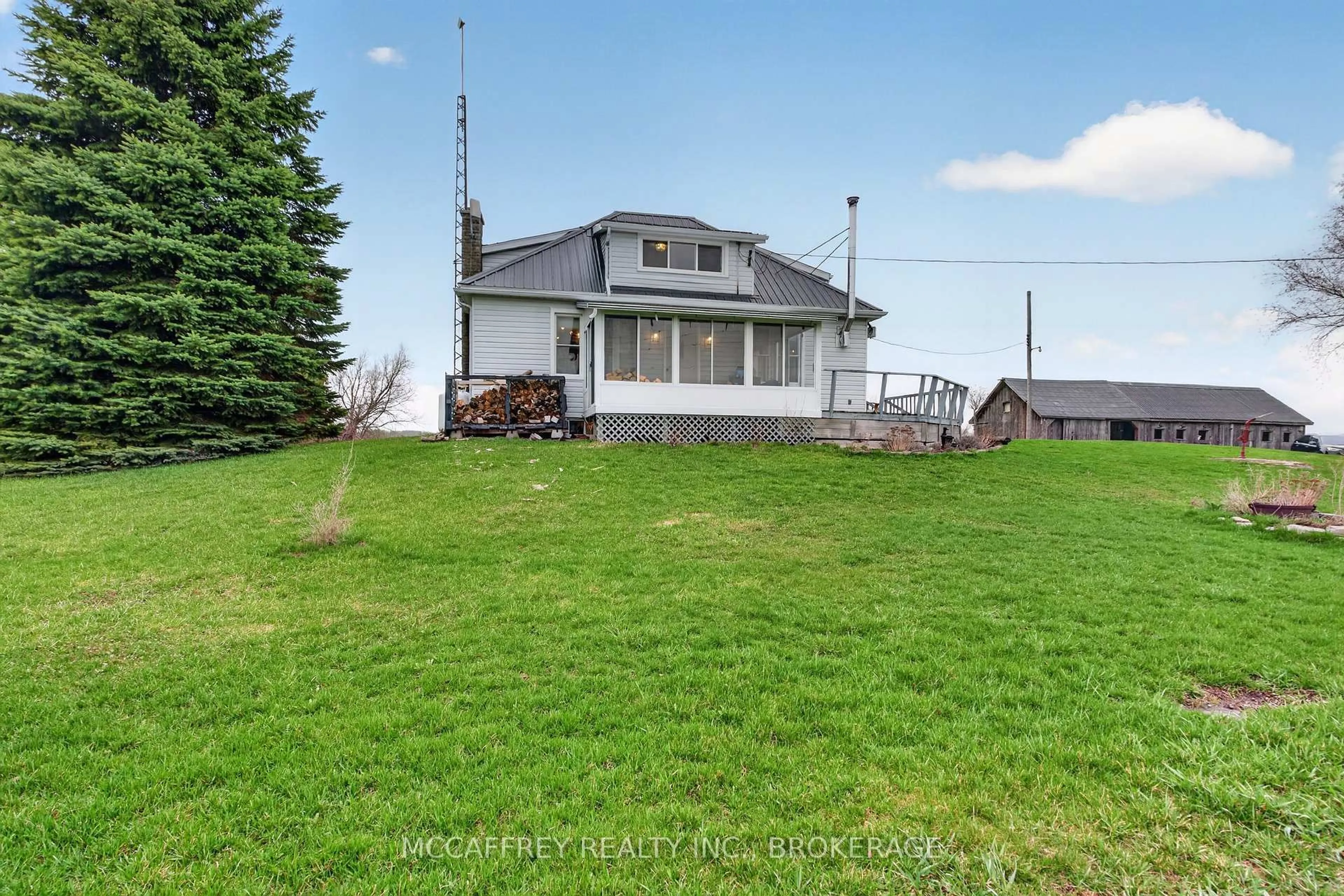 A pic from outside/outdoor area/front of a property/back of a property/a pic from drone, water/lake/river/ocean view for 4868 County Road 8, Napanee Ontario K7R 3K8
