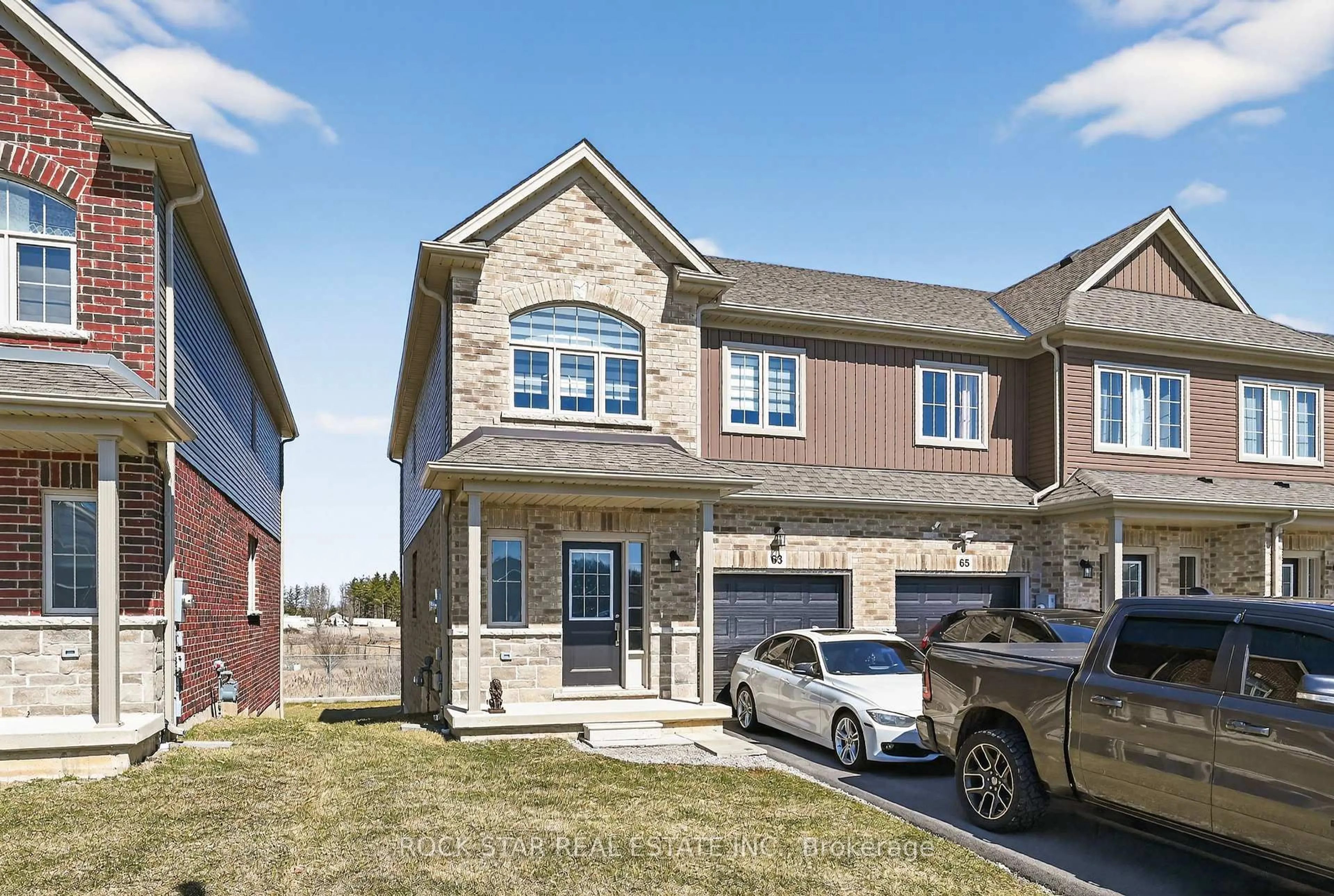 Home with brick exterior material, street for 63 Lloyd Davies Way, Hamilton Ontario L0R 1C0