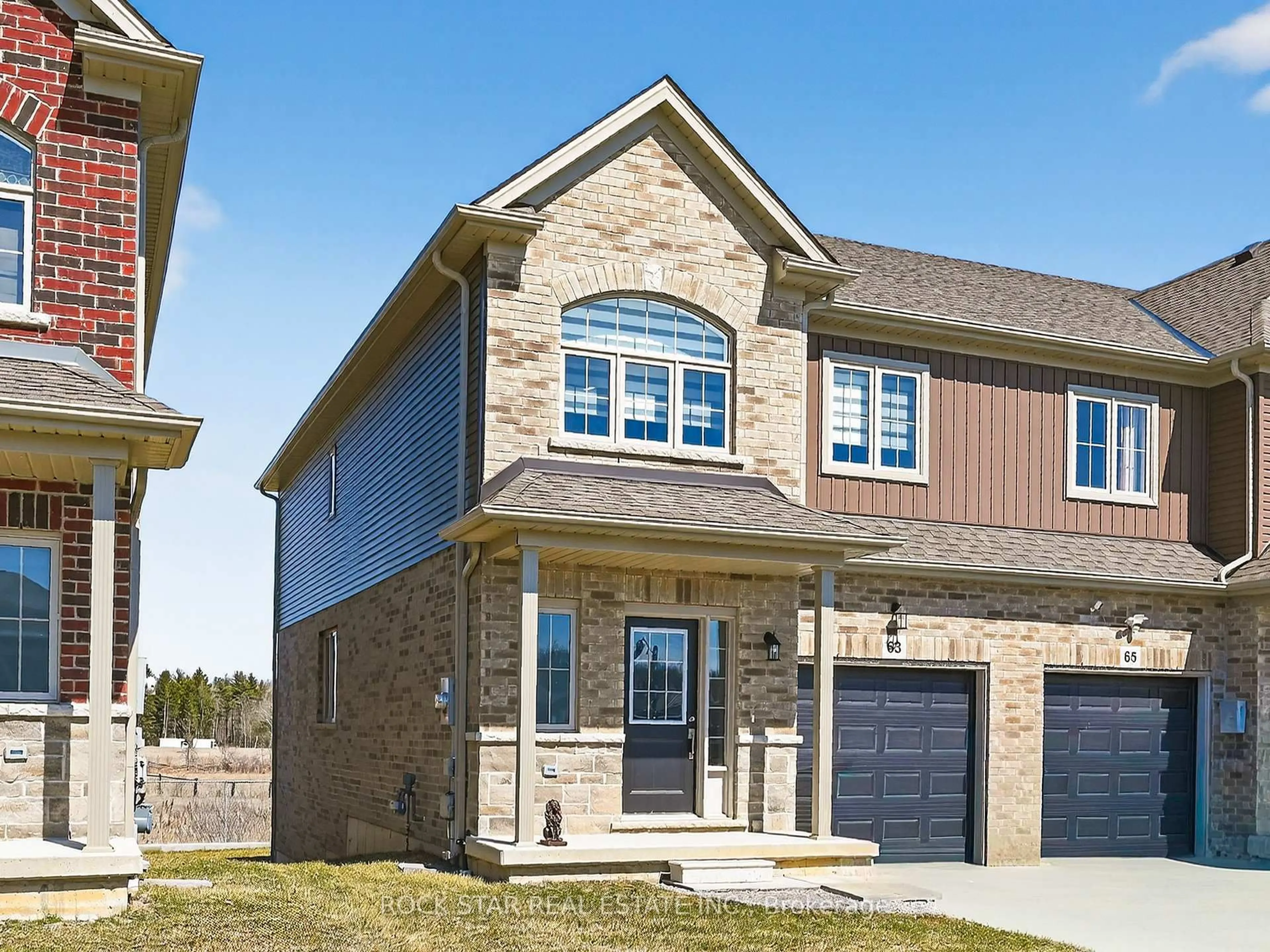 Home with brick exterior material, street for 63 Lloyd Davies Way, Hamilton Ontario L0R 1C0