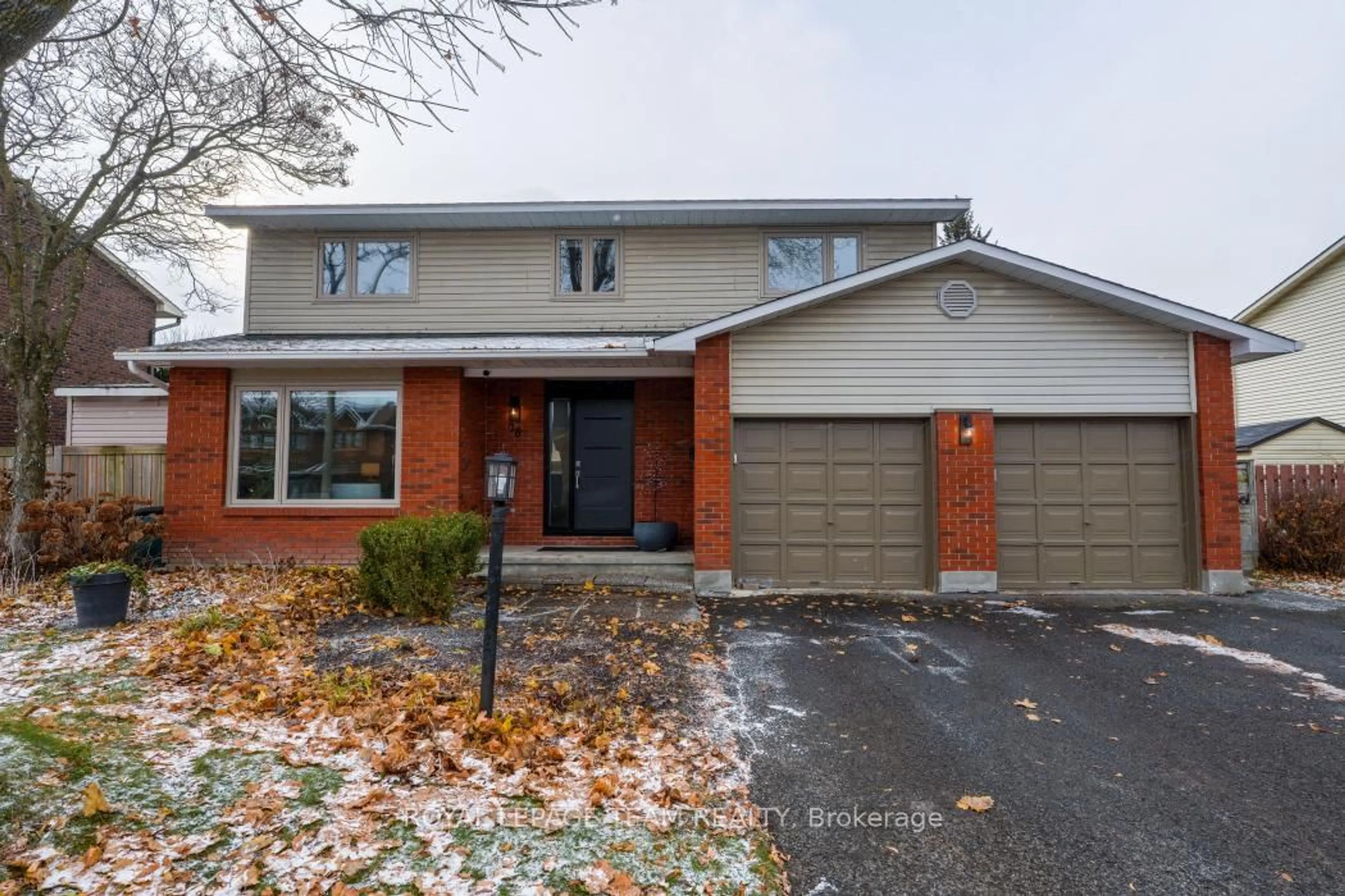 Home with brick exterior material, street for 28 Holitman Dr, Barrhaven Ontario K2J 2A9