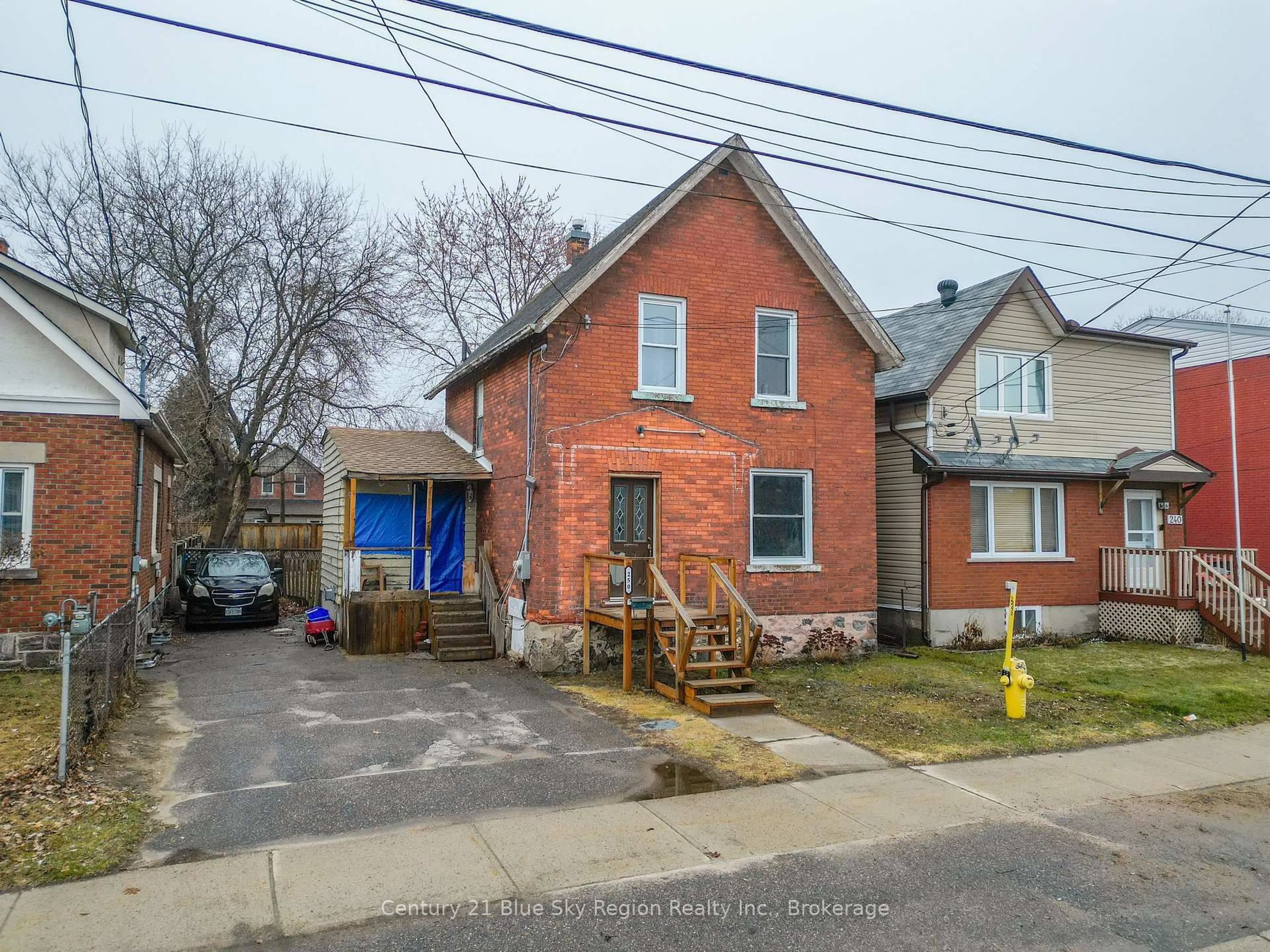 Home with brick exterior material, street for 250 Fifth Ave, North Bay Ontario P1B 3N6