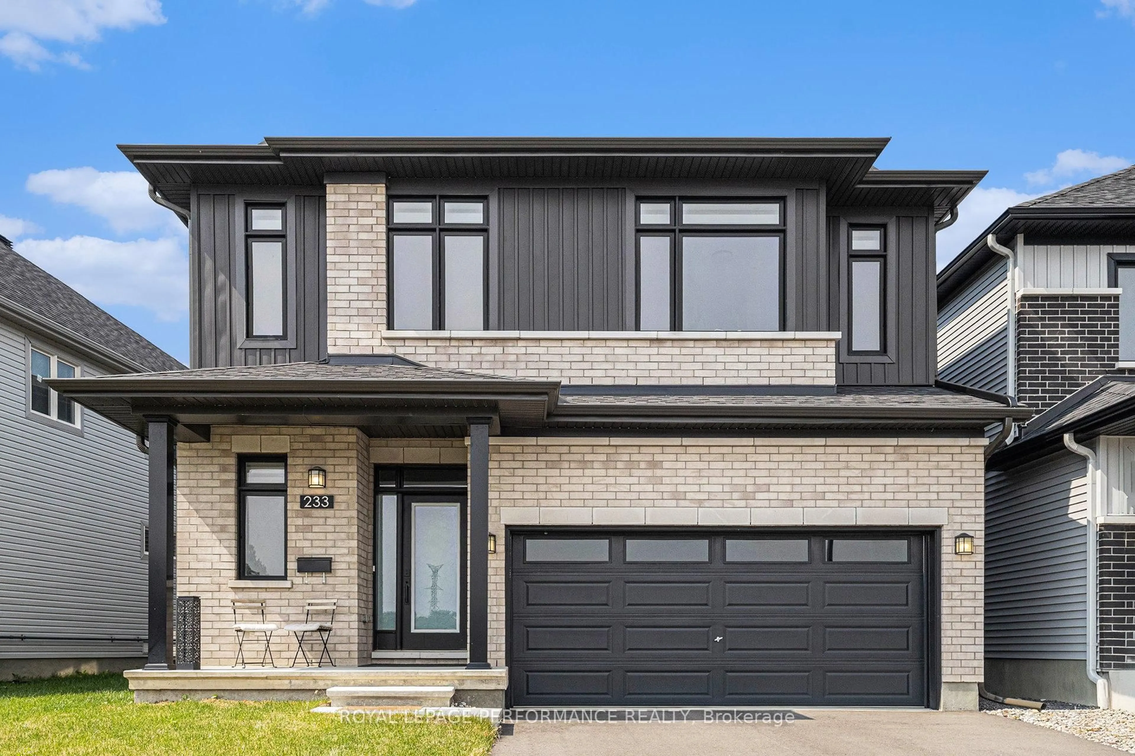 Home with brick exterior material, street for 233 Beaugency St, Ottawa Ontario K1W 0T2