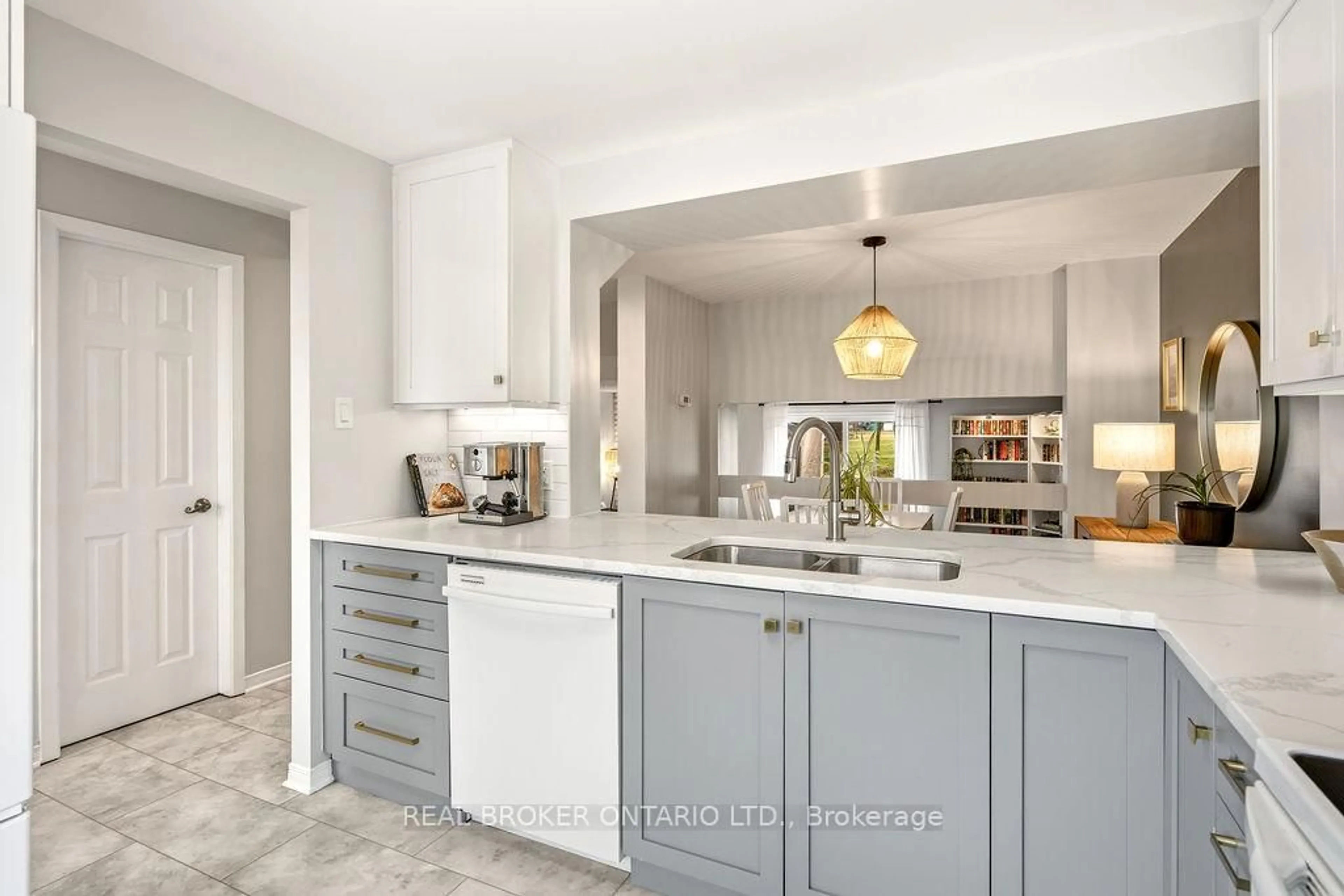 Open concept kitchen, ceramic/tile floor for 1095 Avignon Crt, Ottawa Ontario K1C 2M2