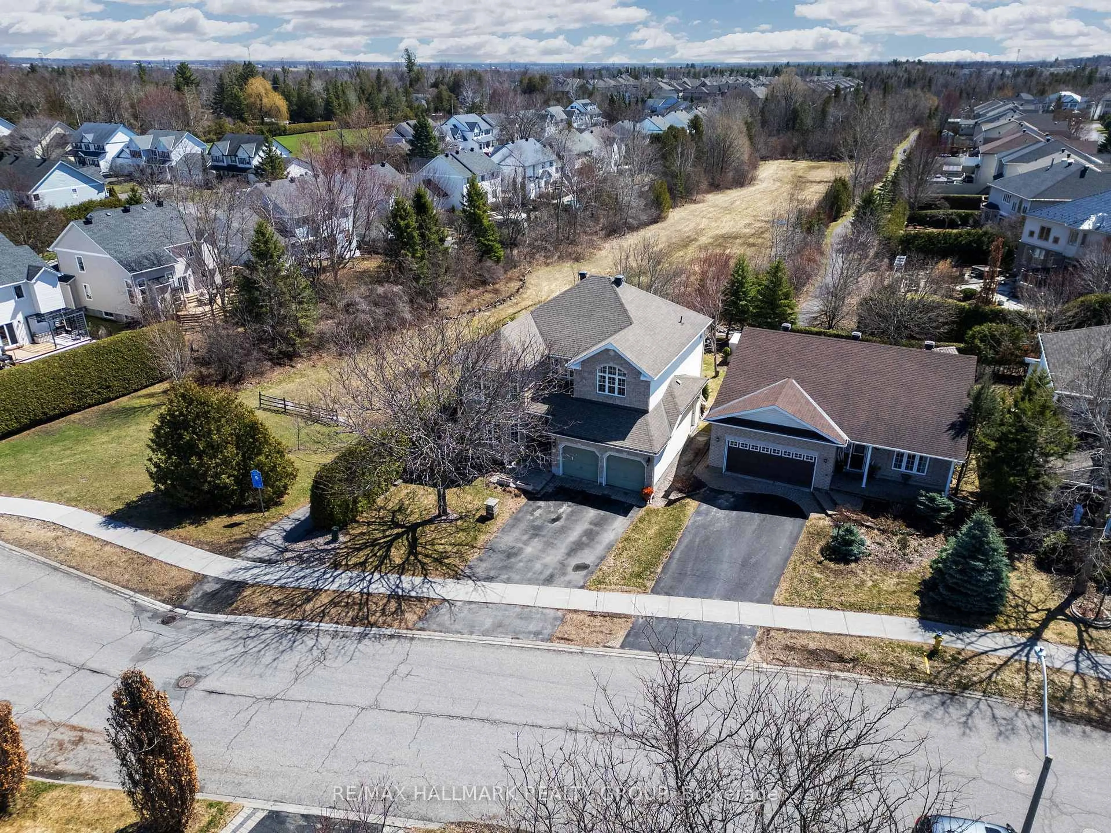 A pic from outside/outdoor area/front of a property/back of a property/a pic from drone, street for 47 Snowberry Way, Ottawa Ontario K2S 2A8