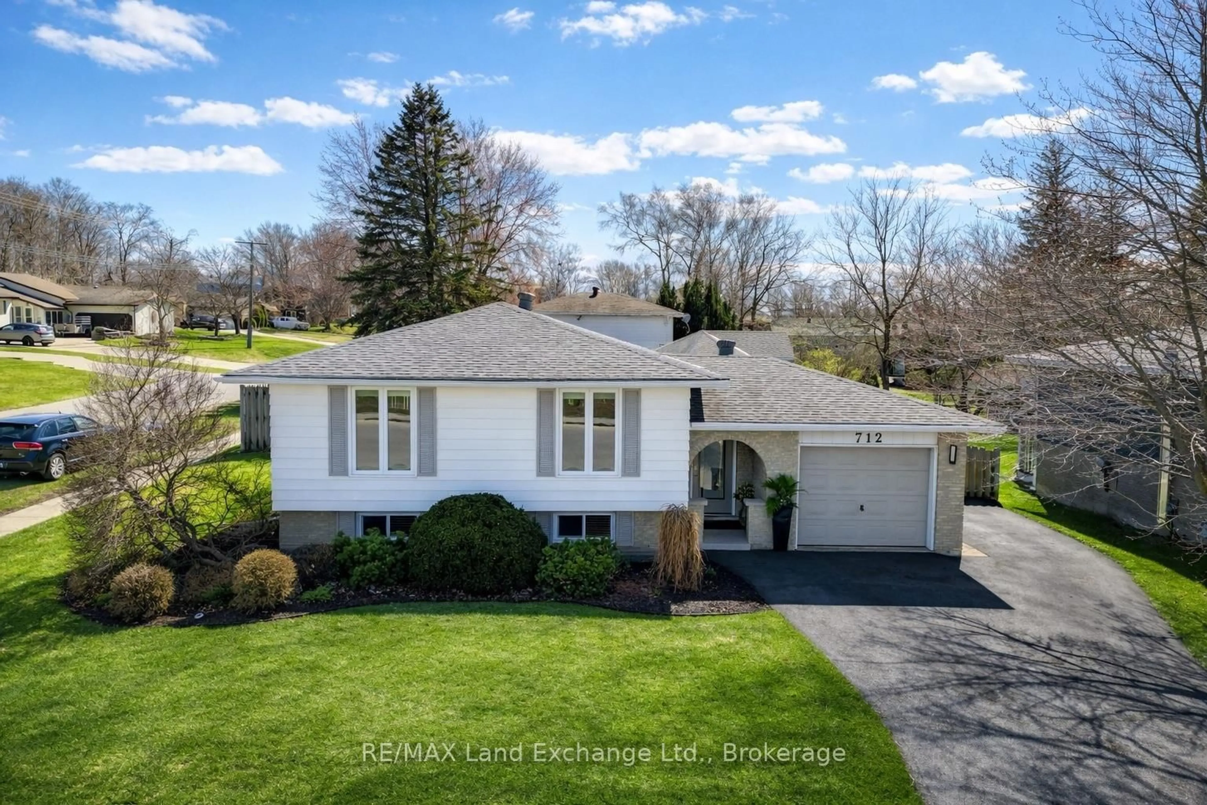 A pic from outside/outdoor area/front of a property/back of a property/a pic from drone, street for 712 Louis St, Saugeen Shores Ontario N0H 2C4