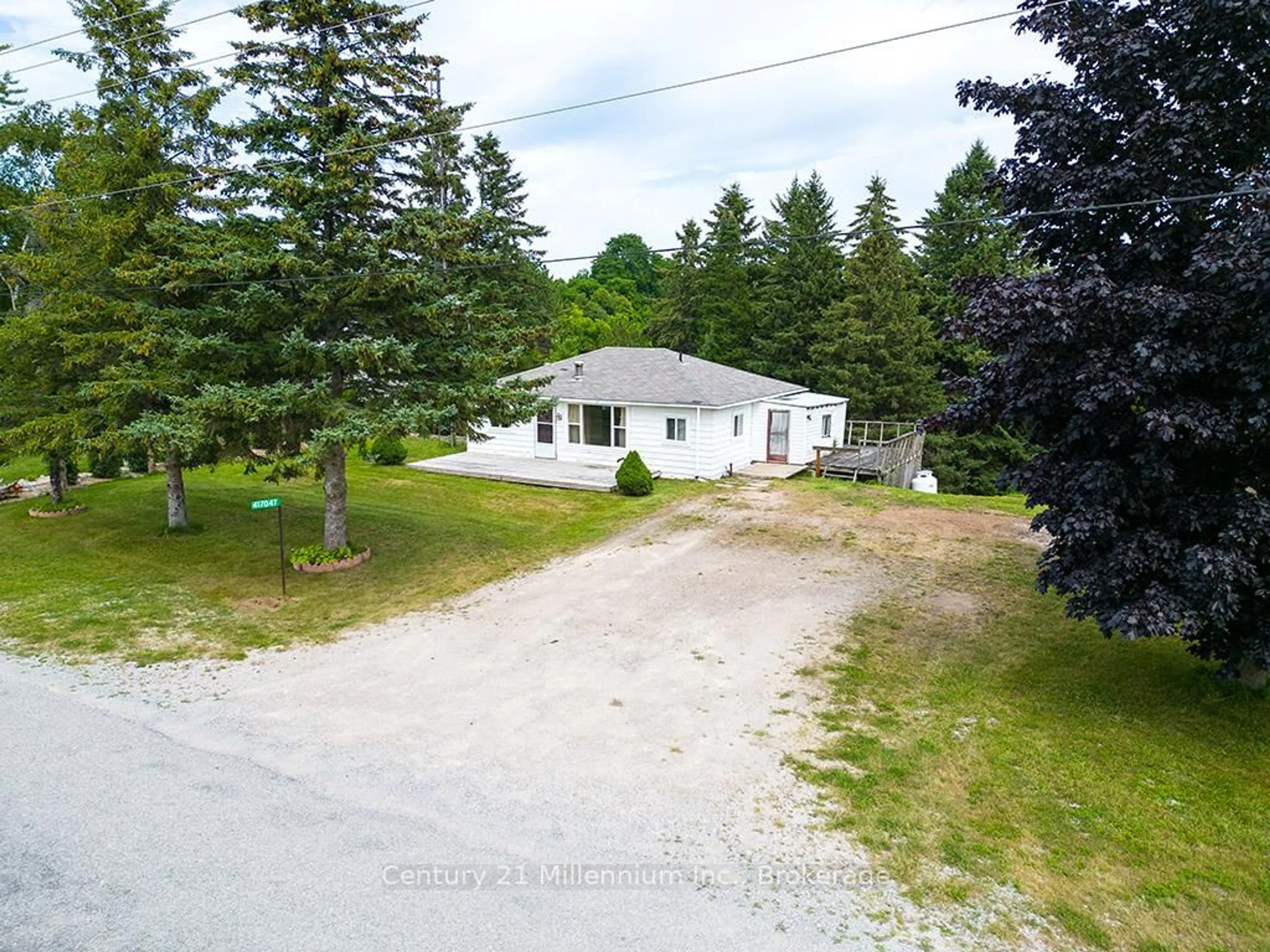 A pic from outside/outdoor area/front of a property/back of a property/a pic from drone, street for 417047 Tenth Line, Blue Mountains Ontario N0H 1J0