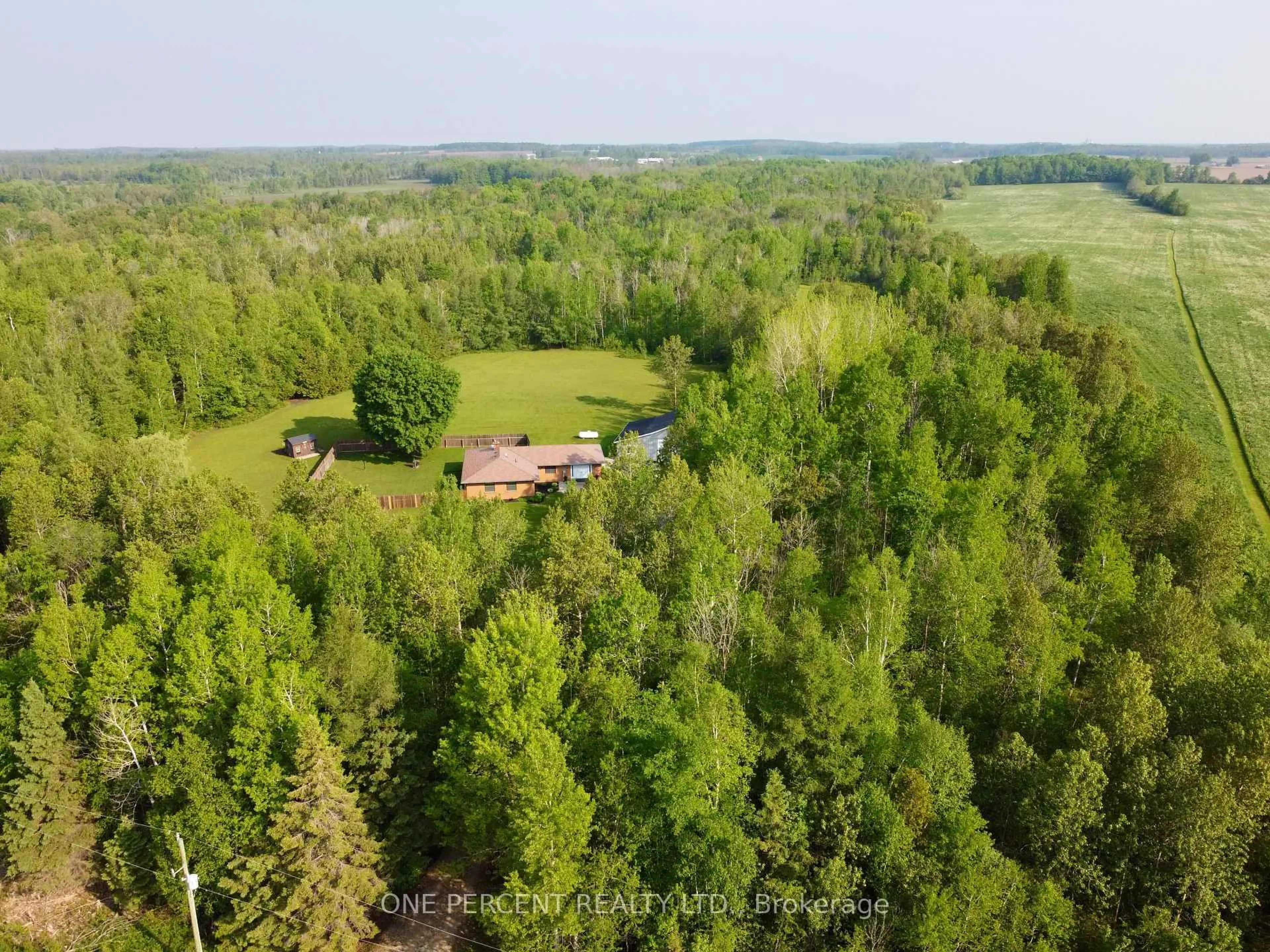 A pic from outside/outdoor area/front of a property/back of a property/a pic from drone, forest/trees view for 145269 Southgate Rd 14, Southgate Ontario N0C 1B0