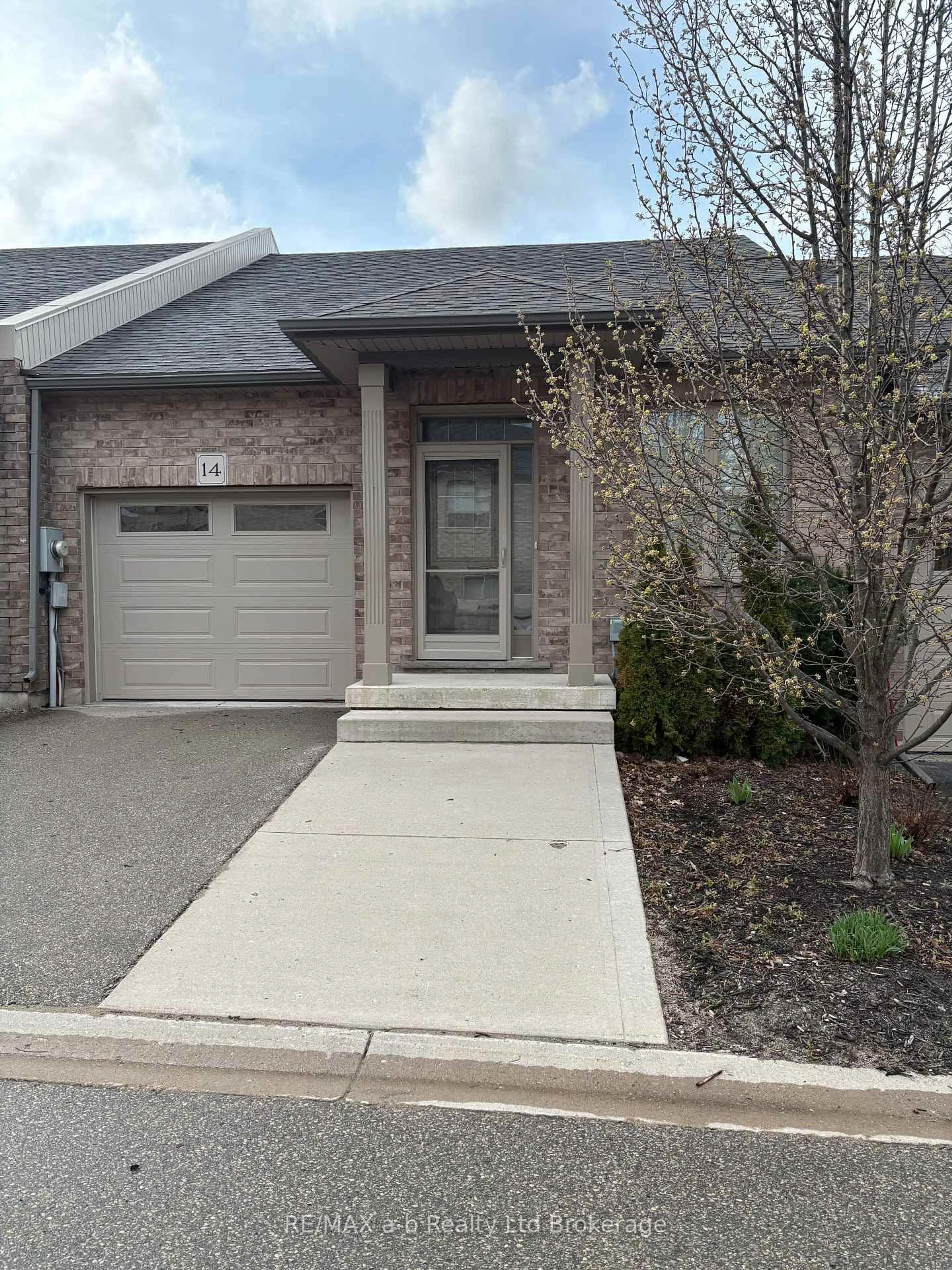 Home with brick exterior material, street for 111 King Street East, Unit 14 St, Ingersoll Ontario N5C 1G8