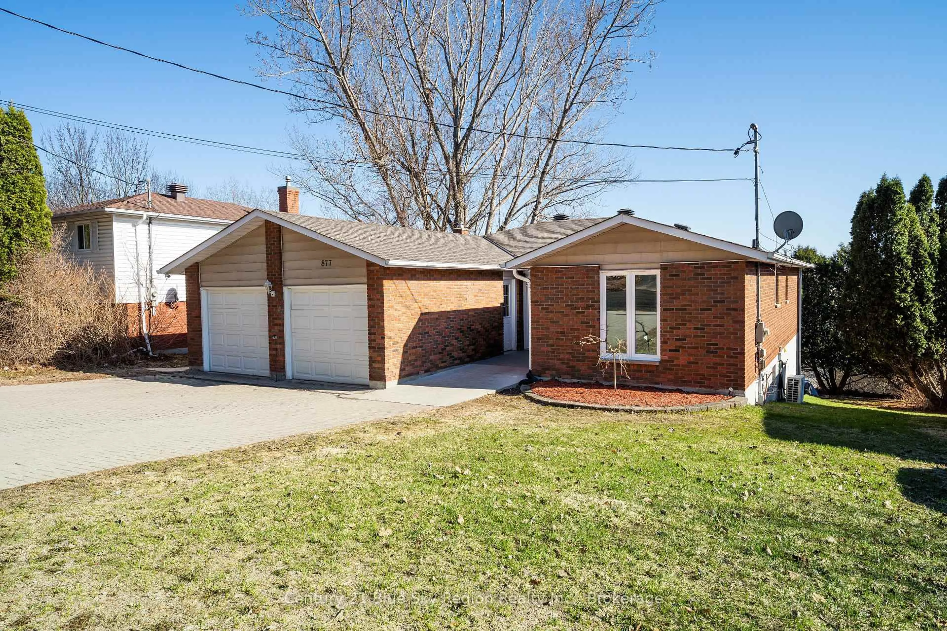 Home with brick exterior material, street for 877 Ski Club Rd, North Bay Ontario P1B 7R5