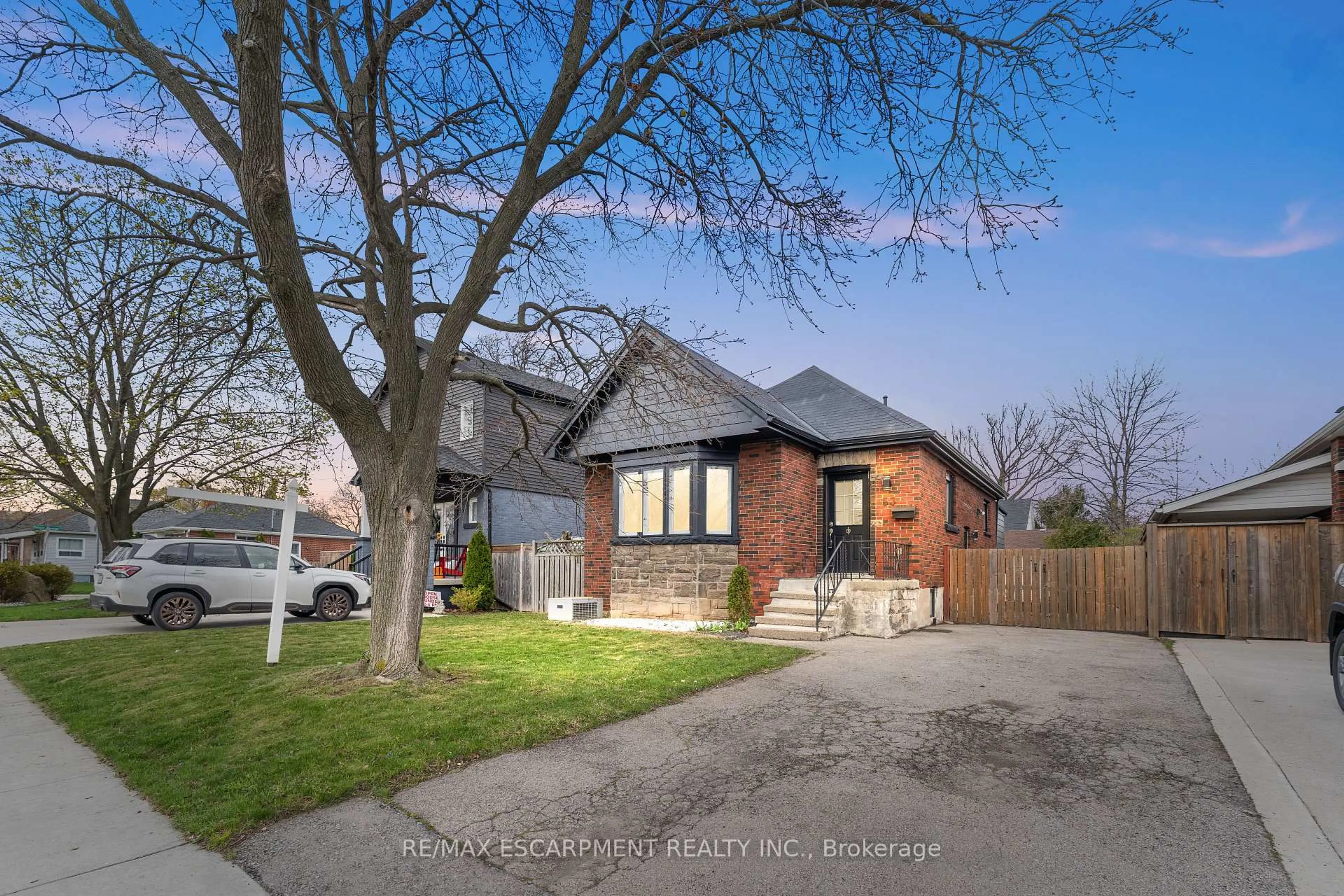 Home with brick exterior material, street for 53 Brucedale Ave, Hamilton Ontario L9A 1N2