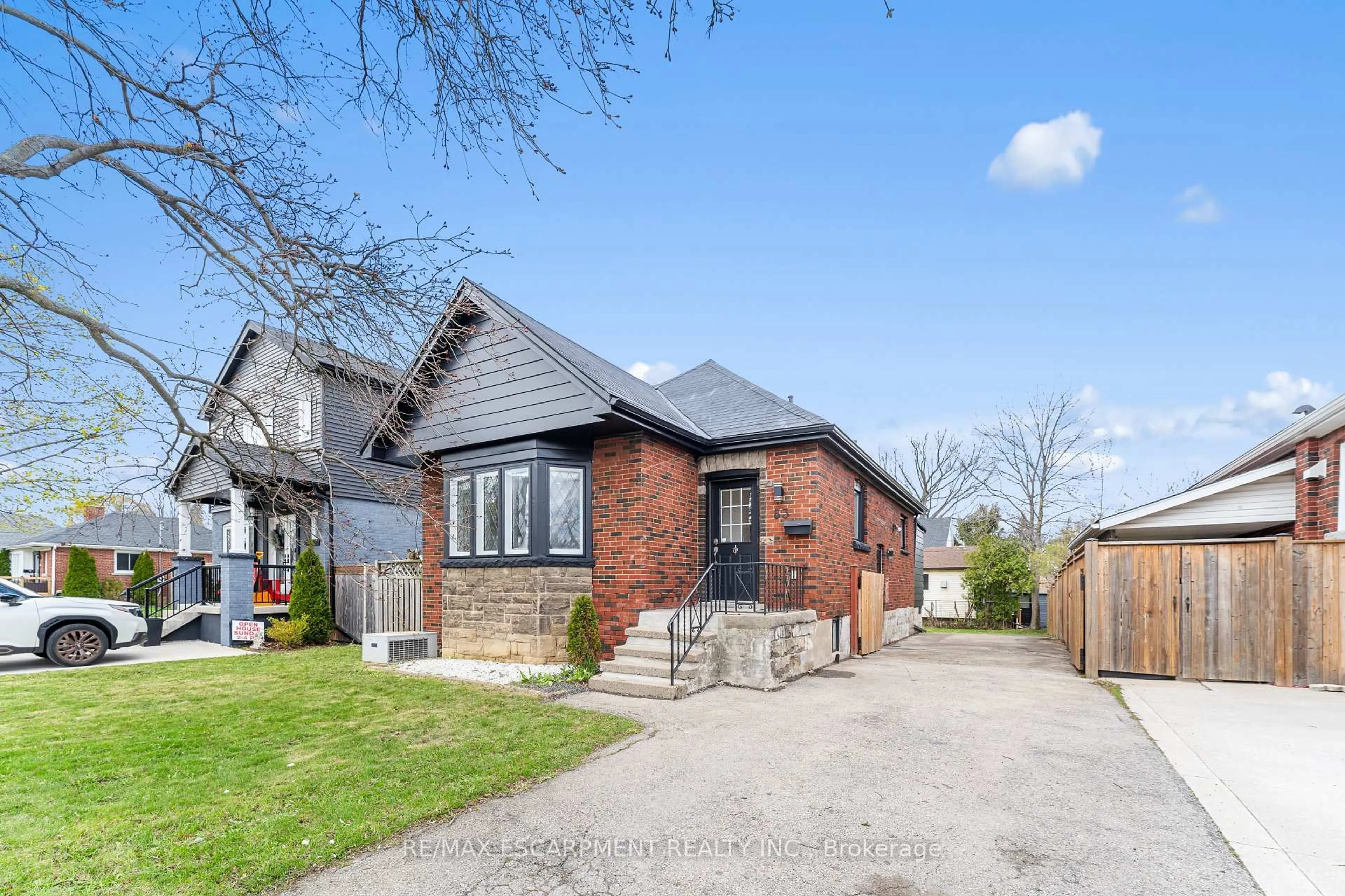 Home with brick exterior material, street for 53 Brucedale Ave, Hamilton Ontario L9A 1N2