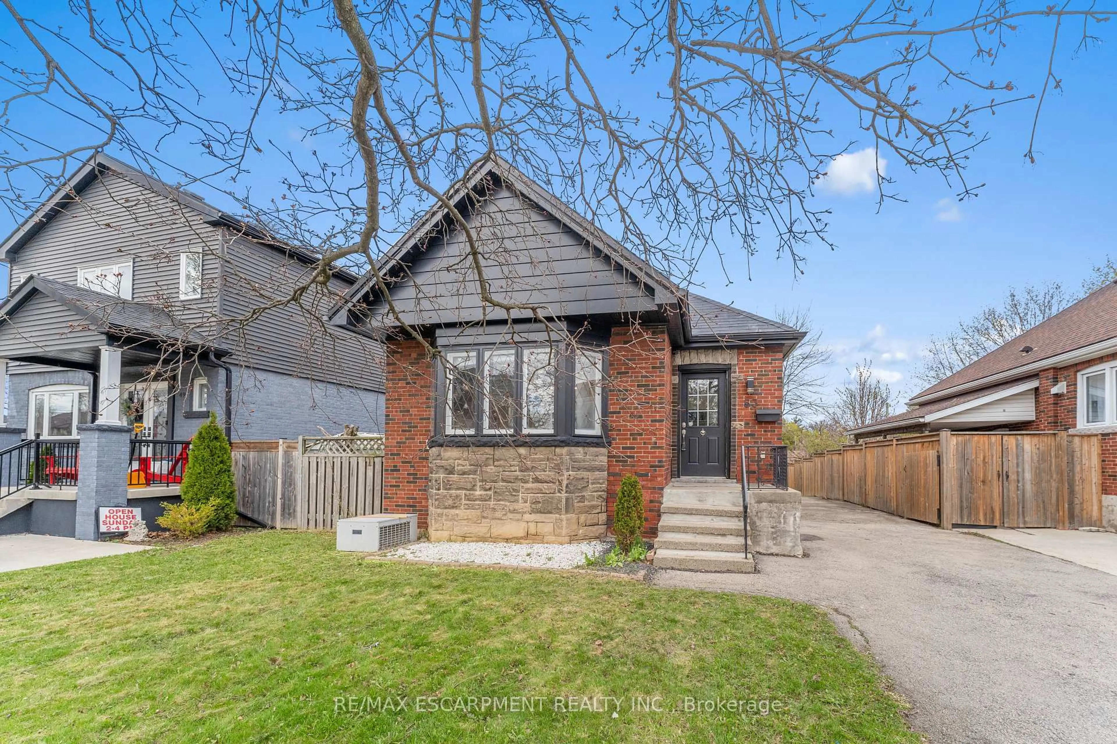 Home with brick exterior material, street for 53 Brucedale Ave, Hamilton Ontario L9A 1N2