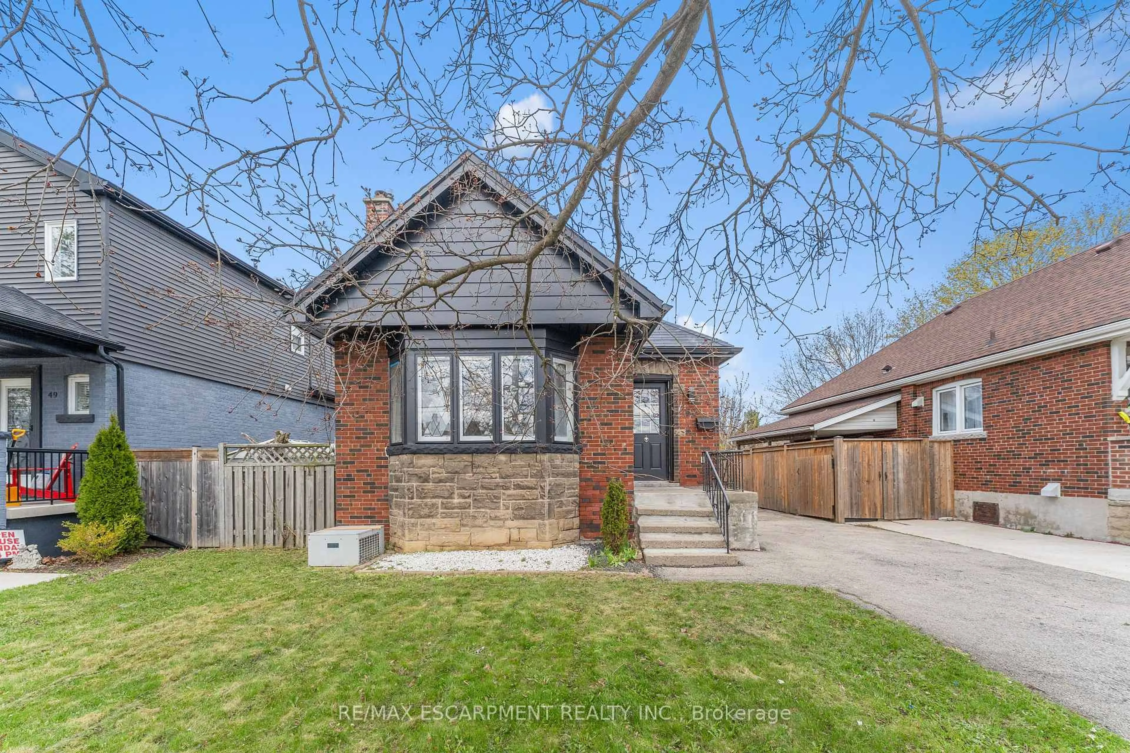 Home with brick exterior material, street for 53 Brucedale Ave, Hamilton Ontario L9A 1N2