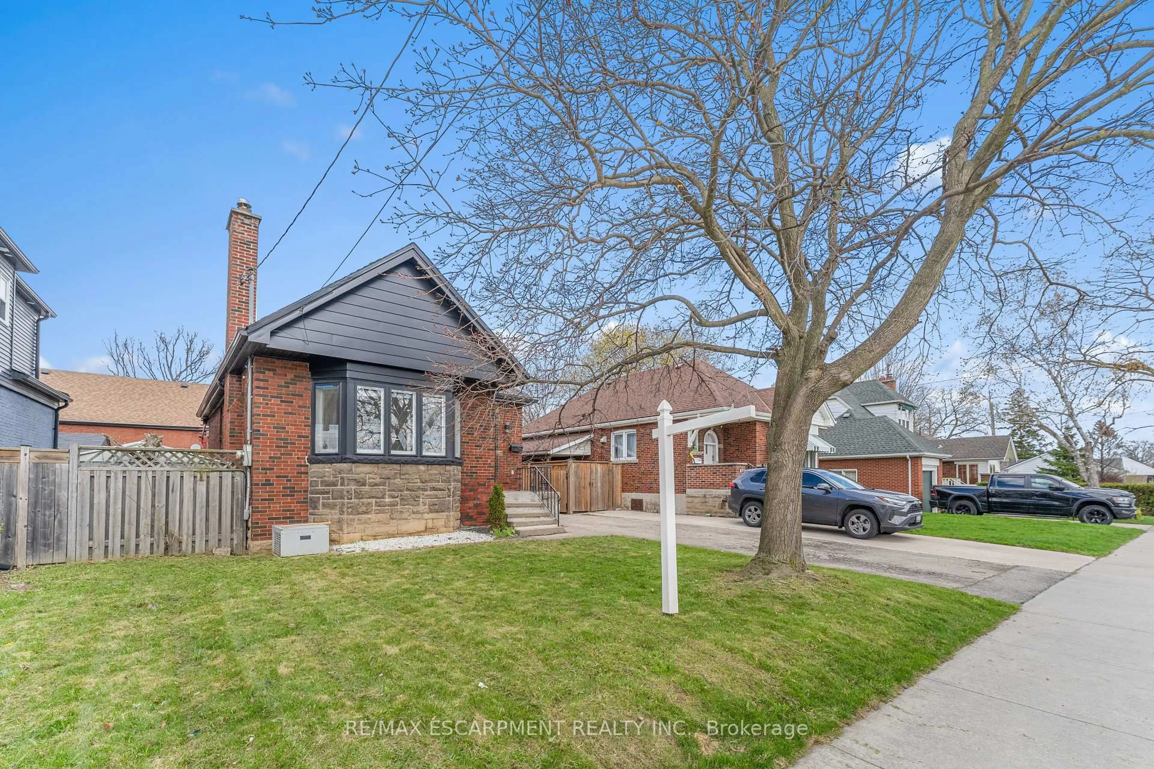 Home with brick exterior material, street for 53 Brucedale Ave, Hamilton Ontario L9A 1N2