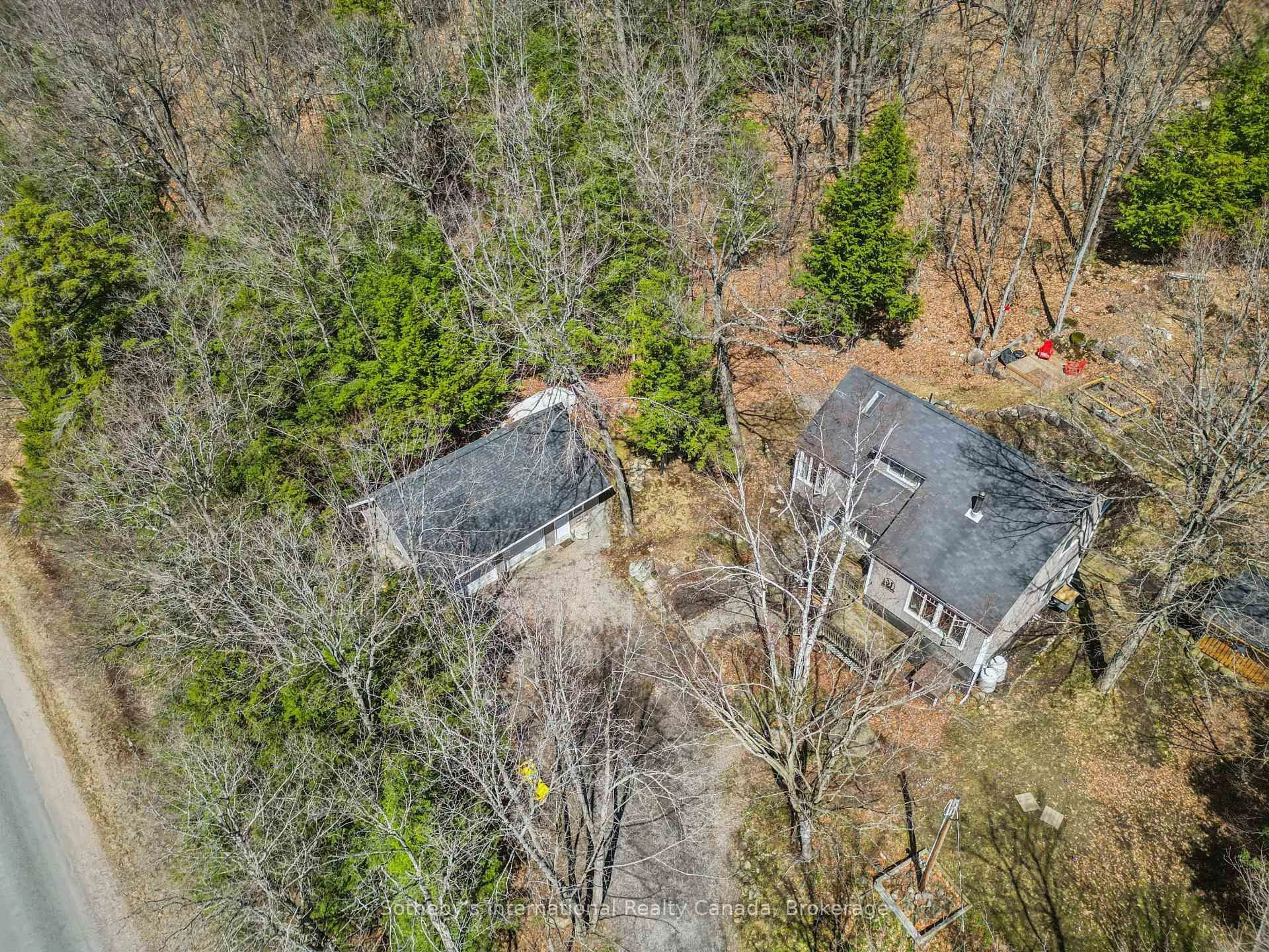 A pic from outside/outdoor area/front of a property/back of a property/a pic from drone, forest/trees view for 1037 Foreman Rd, Muskoka Lakes Ontario P0B 1J0
