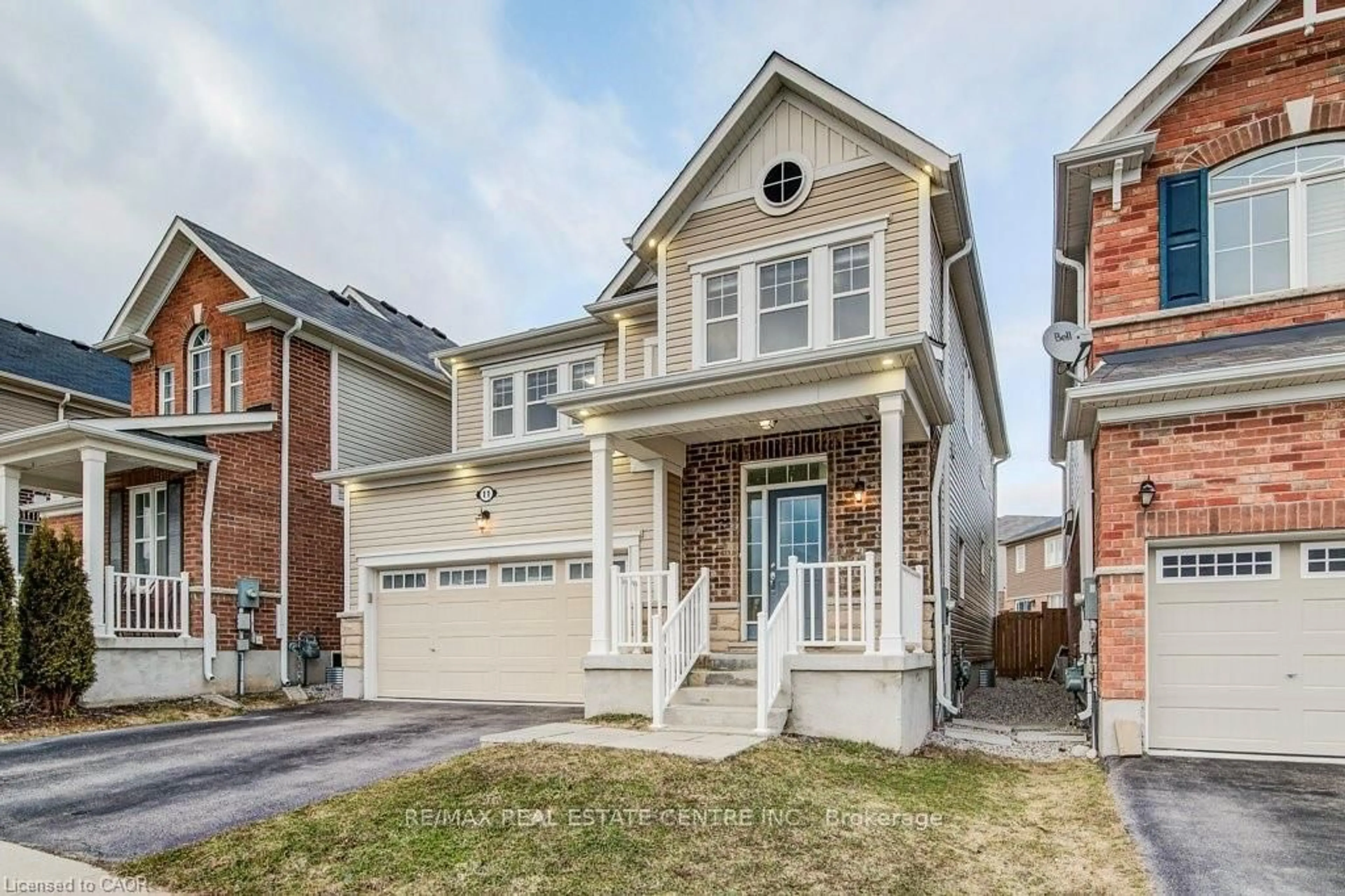 Home with brick exterior material, street for 11 Compass Tr, Cambridge Ontario N3E 0B7