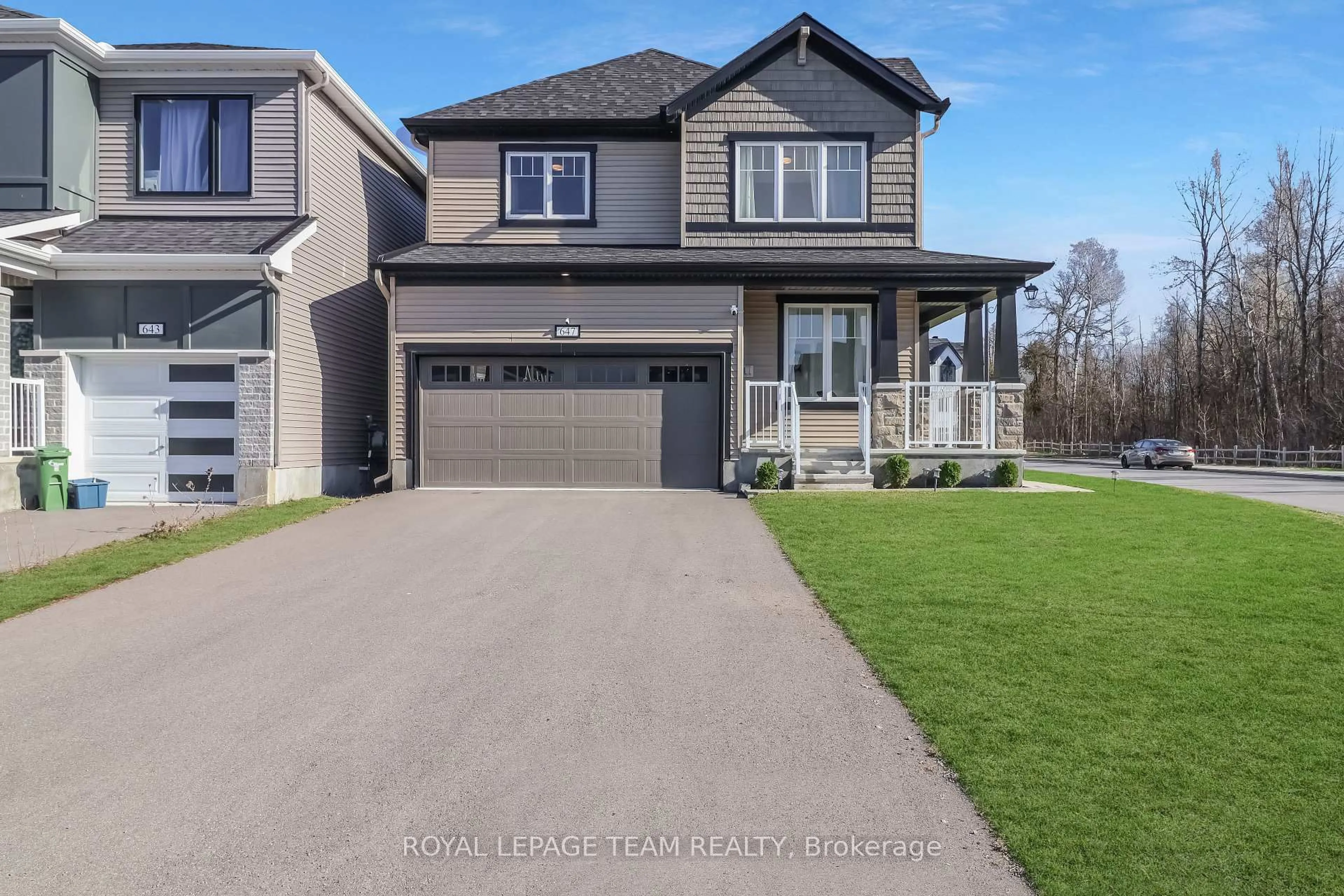 Home with vinyl exterior material, street for 647 Cygnus St, Ottawa Ontario K2J 7A9