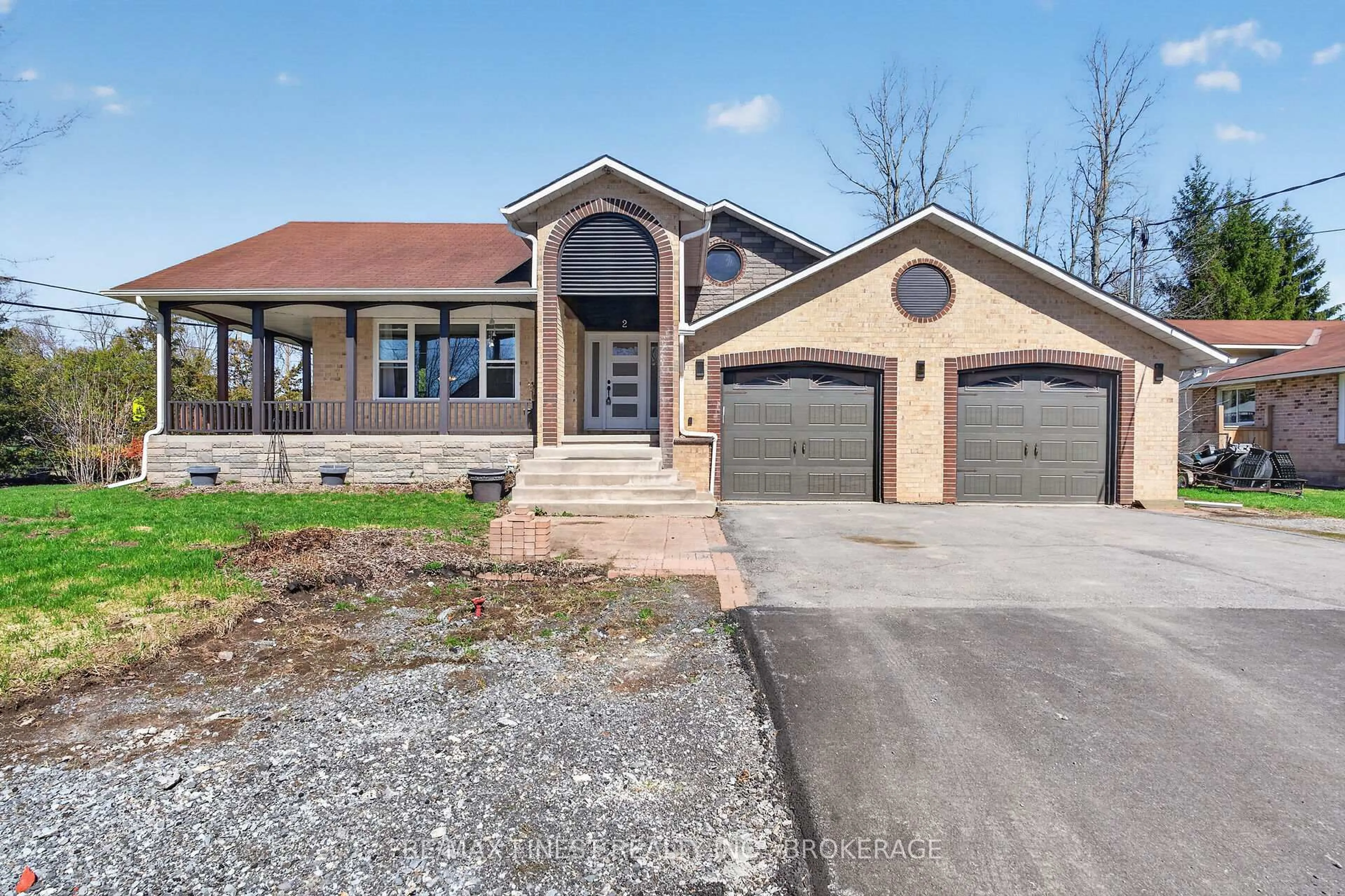 Home with brick exterior material, street for 2 Creighton Dr, Bissett Creek Ontario K0H 2H0