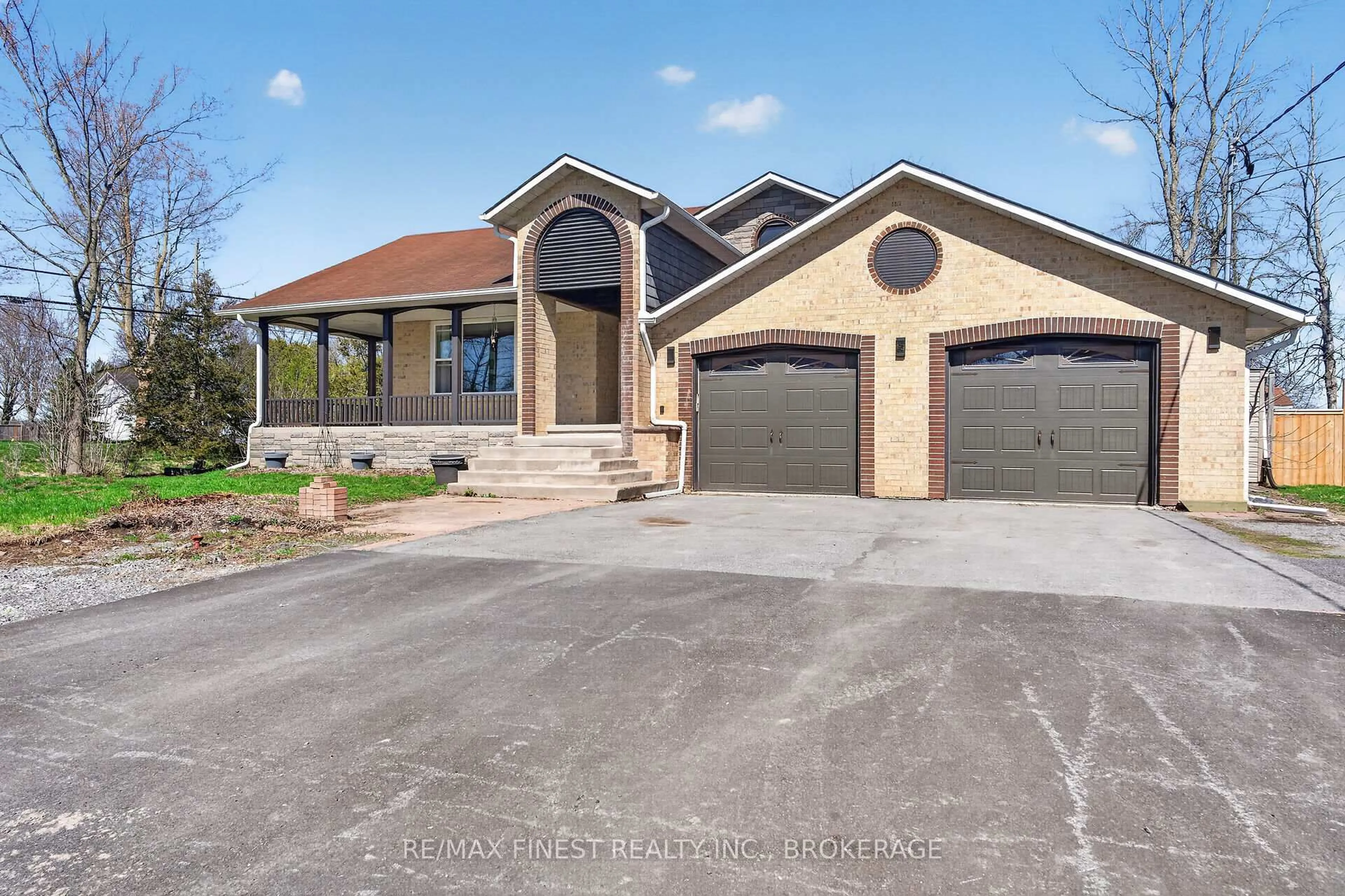 Home with brick exterior material, street for 2 Creighton Dr, Bissett Creek Ontario K0H 2H0