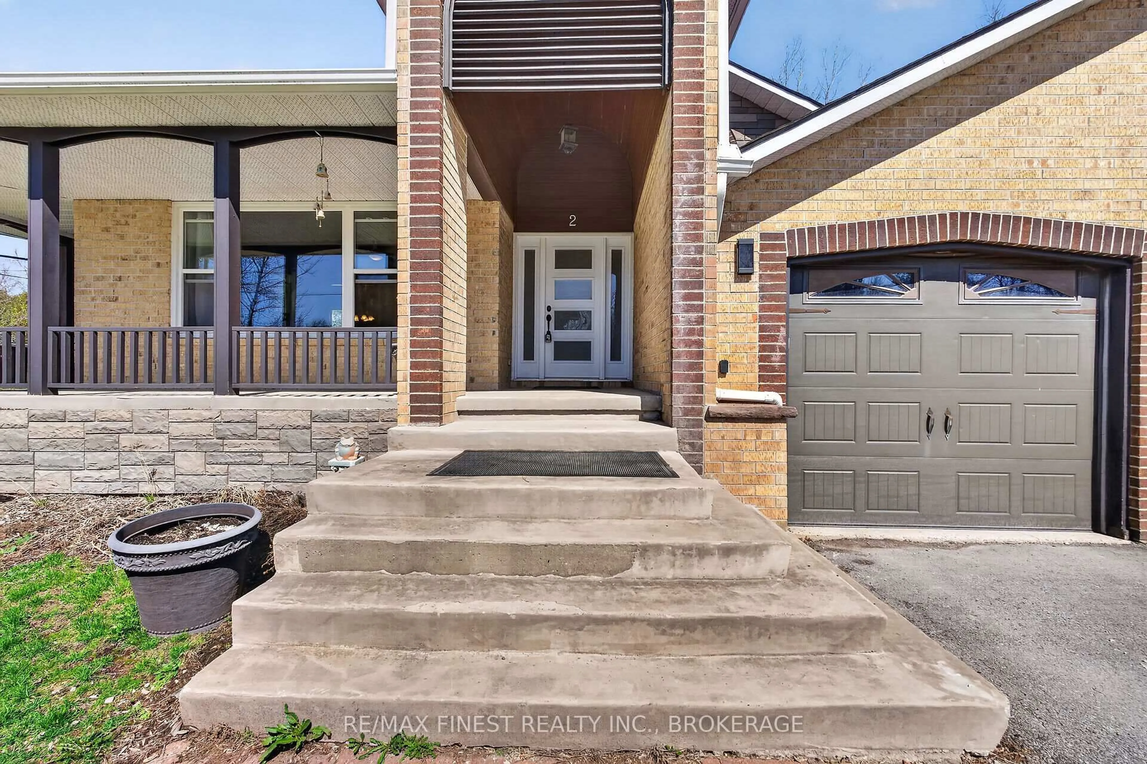 Home with brick exterior material, street for 2 Creighton Dr, Bissett Creek Ontario K0H 2H0