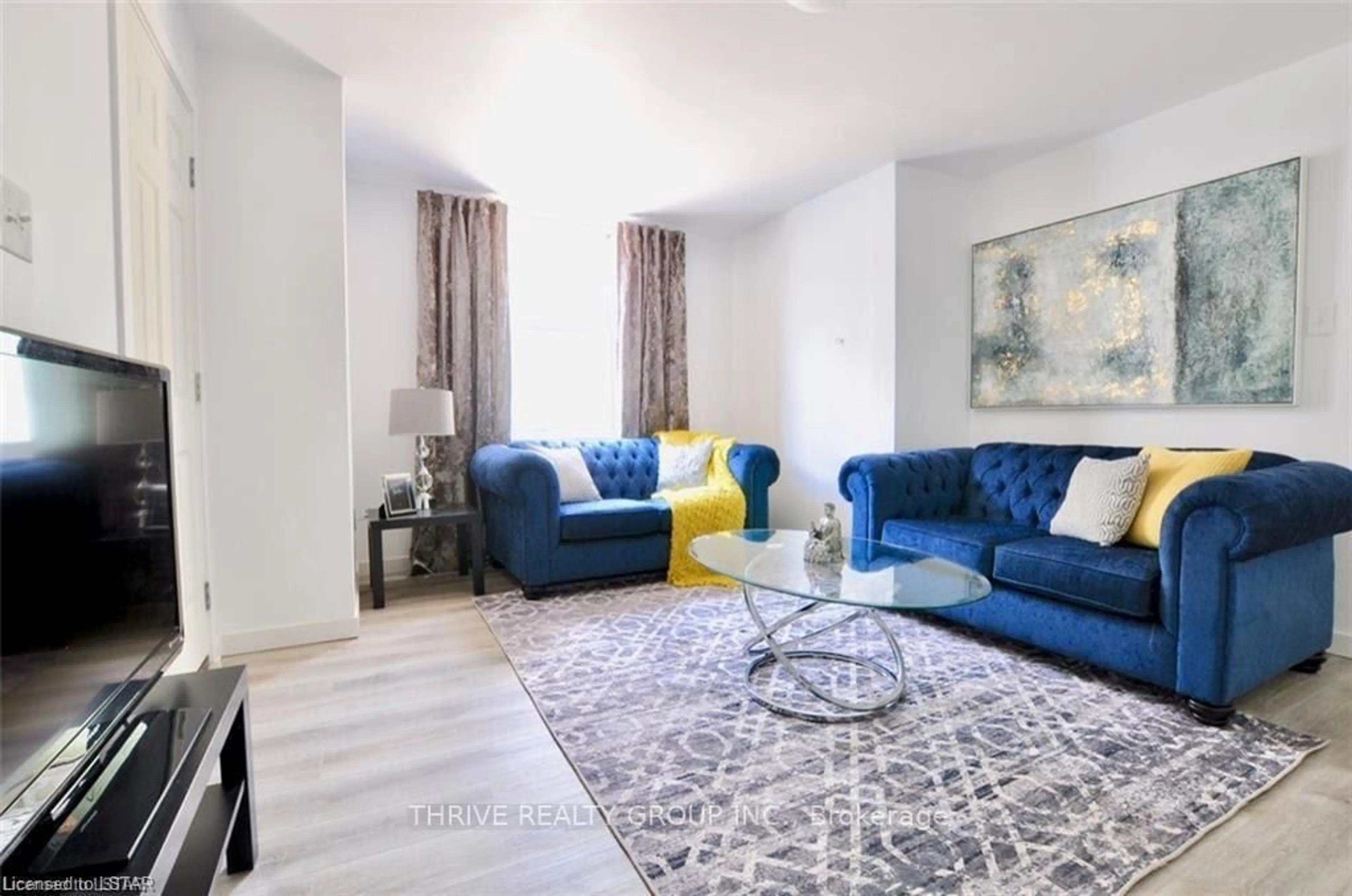 Living room with furniture, carpet floor for 784 Little Grey St, London East Ontario N5Z 1P1