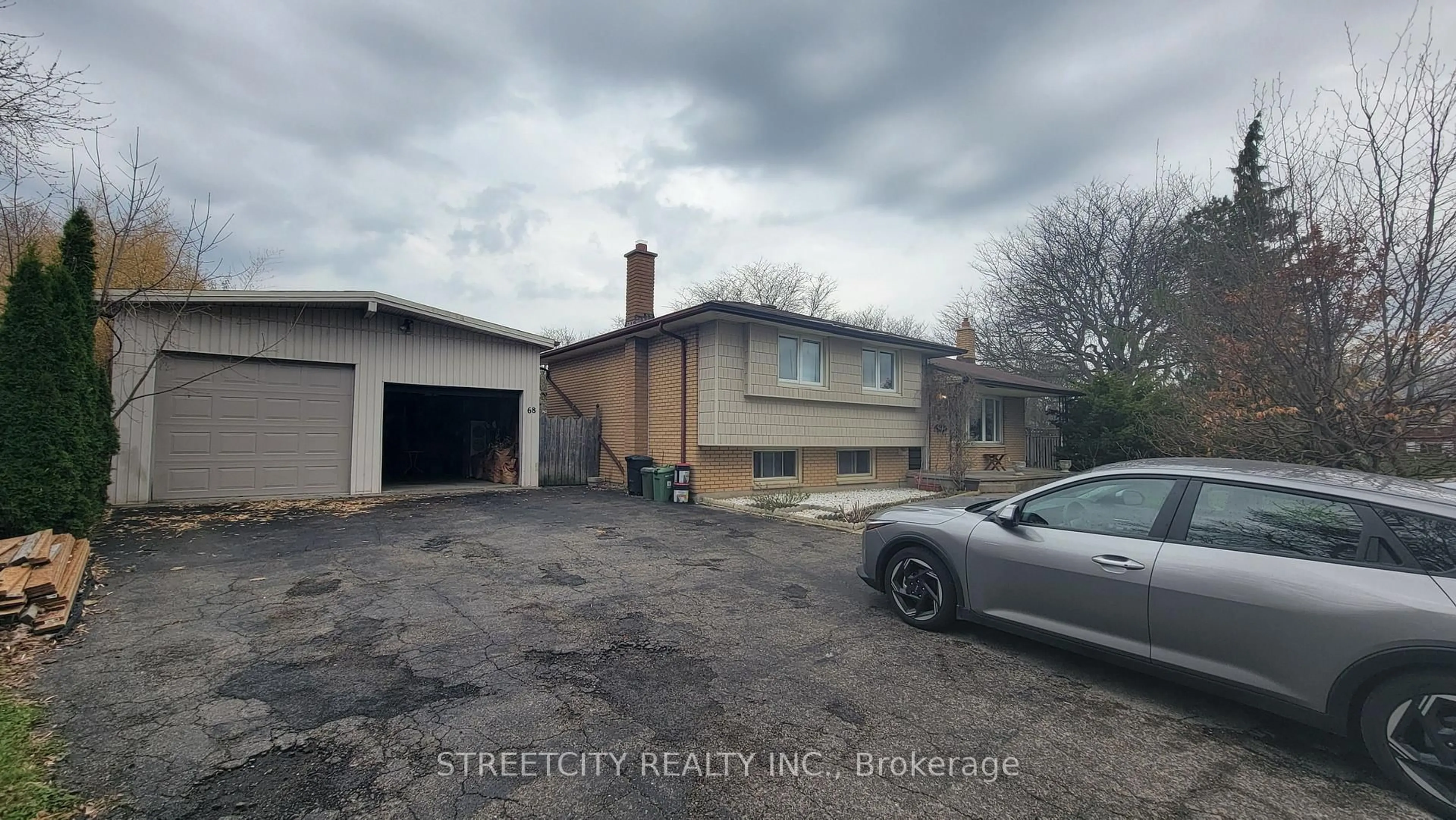 A pic from outside/outdoor area/front of a property/back of a property/a pic from drone, street for 68 Downing Cres, London South Ontario N6C 3C8