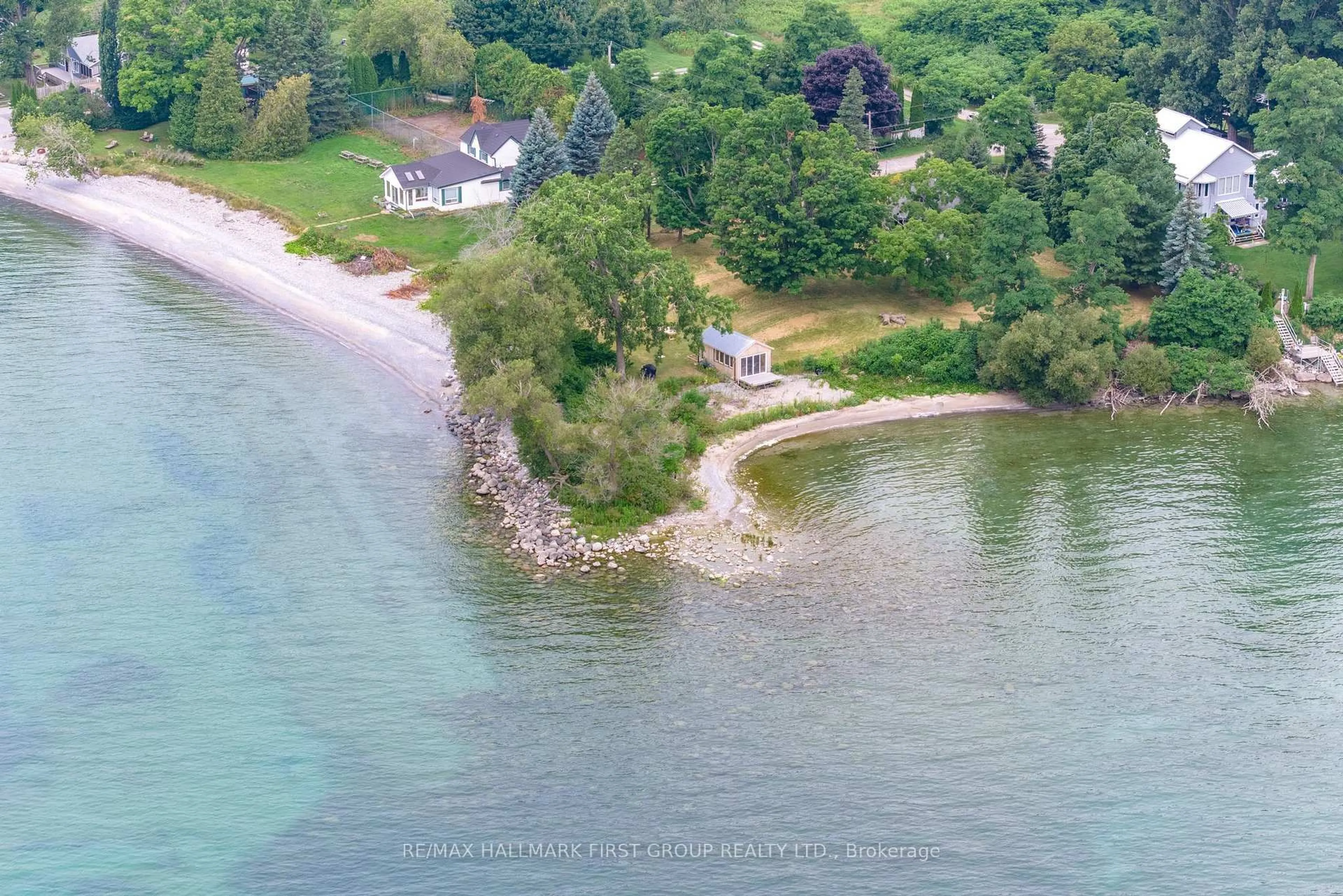 A pic from outside/outdoor area/front of a property/back of a property/a pic from drone, water/lake/river/ocean view for 103 Victoria Beach Rd, Cramahe Ontario K0K 1S0