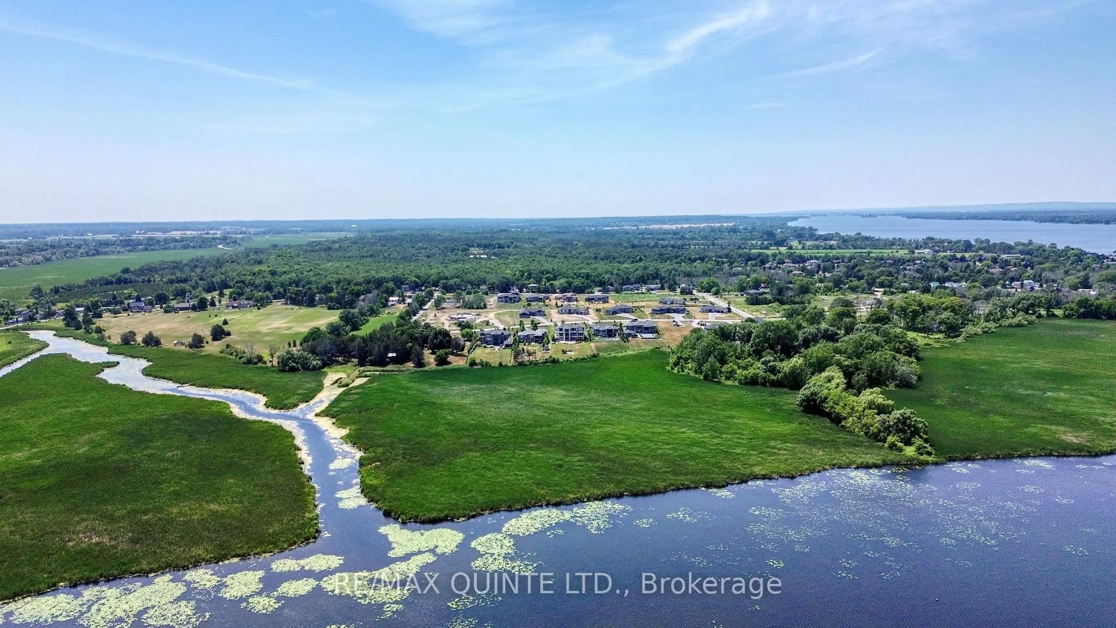 A pic from outside/outdoor area/front of a property/back of a property/a pic from drone, water/lake/river/ocean view for 25 Leaside Dr, Prince Edward County Ontario K8N 4Z7