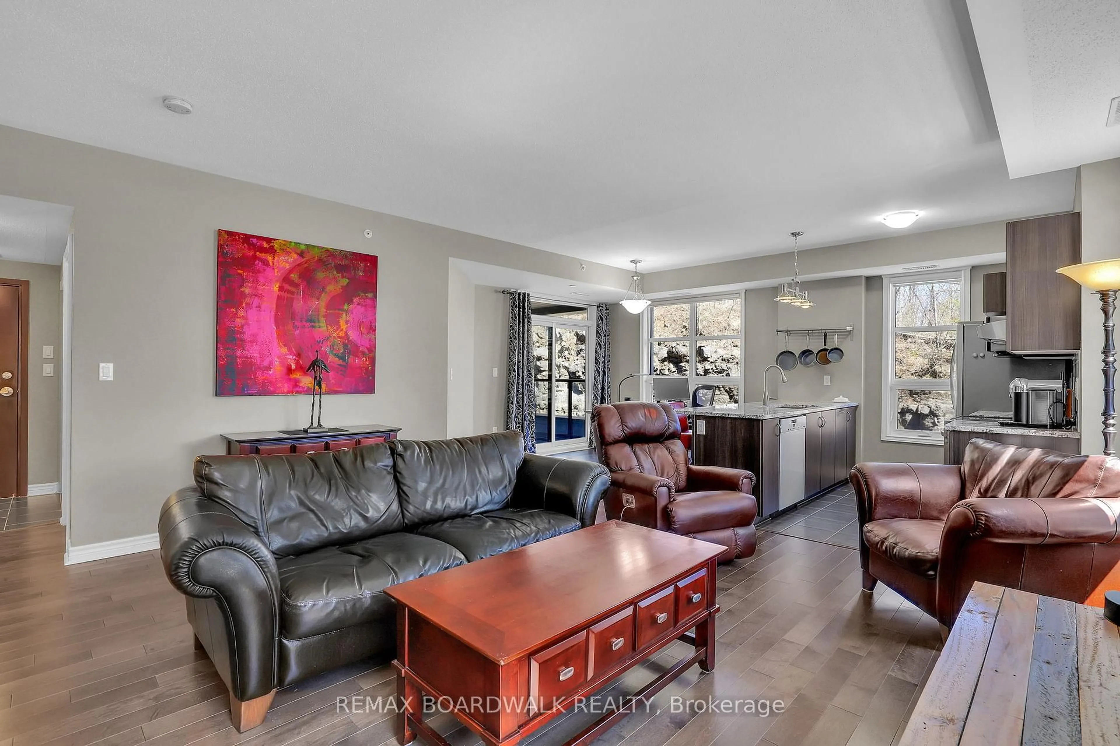 Living room with furniture, unknown for 230 Titanium Private ##202, Ottawa Ontario K1C 0C1