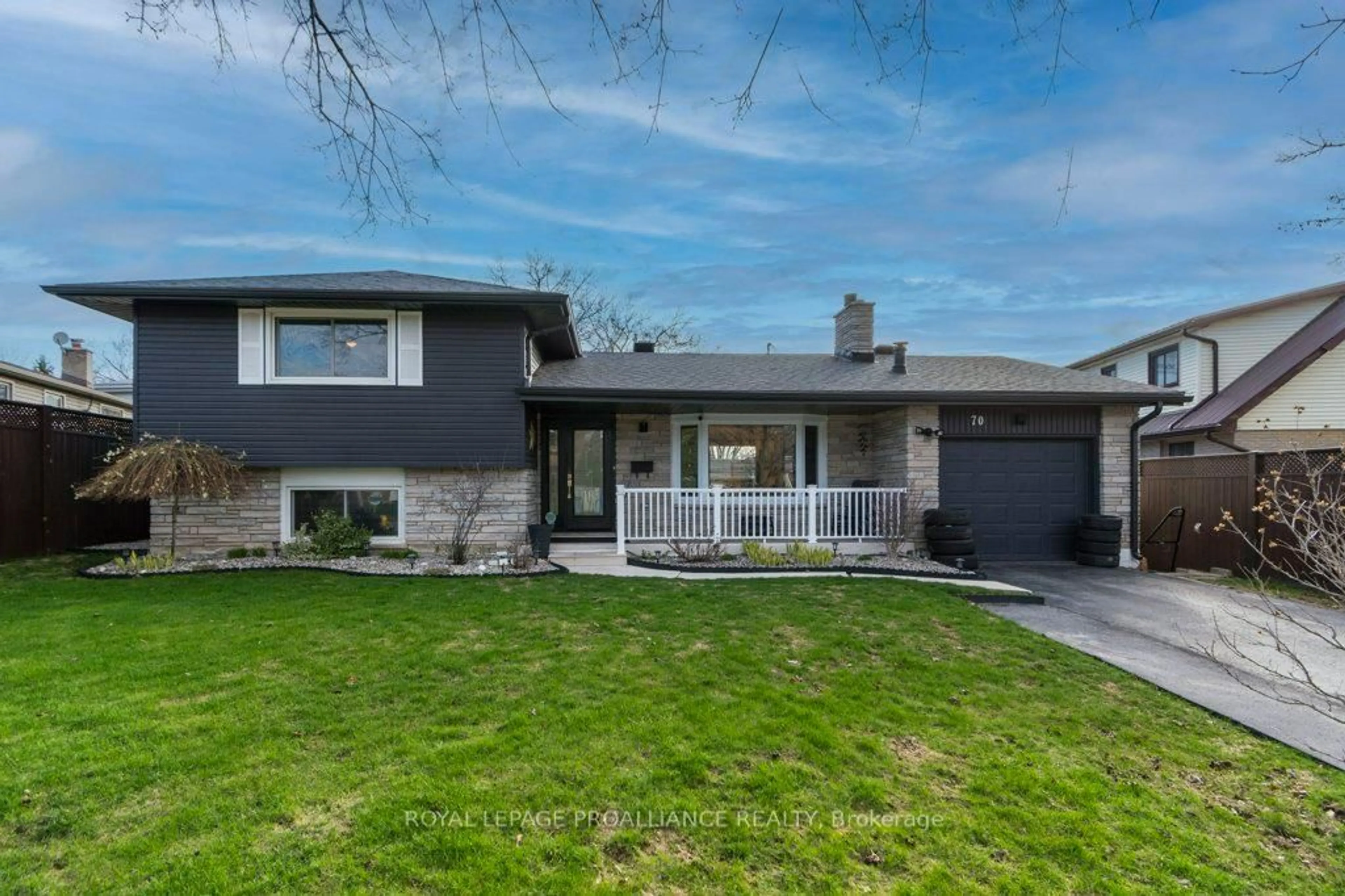 Home with vinyl exterior material, street for 70 Tripp Blvd, Quinte West Ontario K8V 5P6