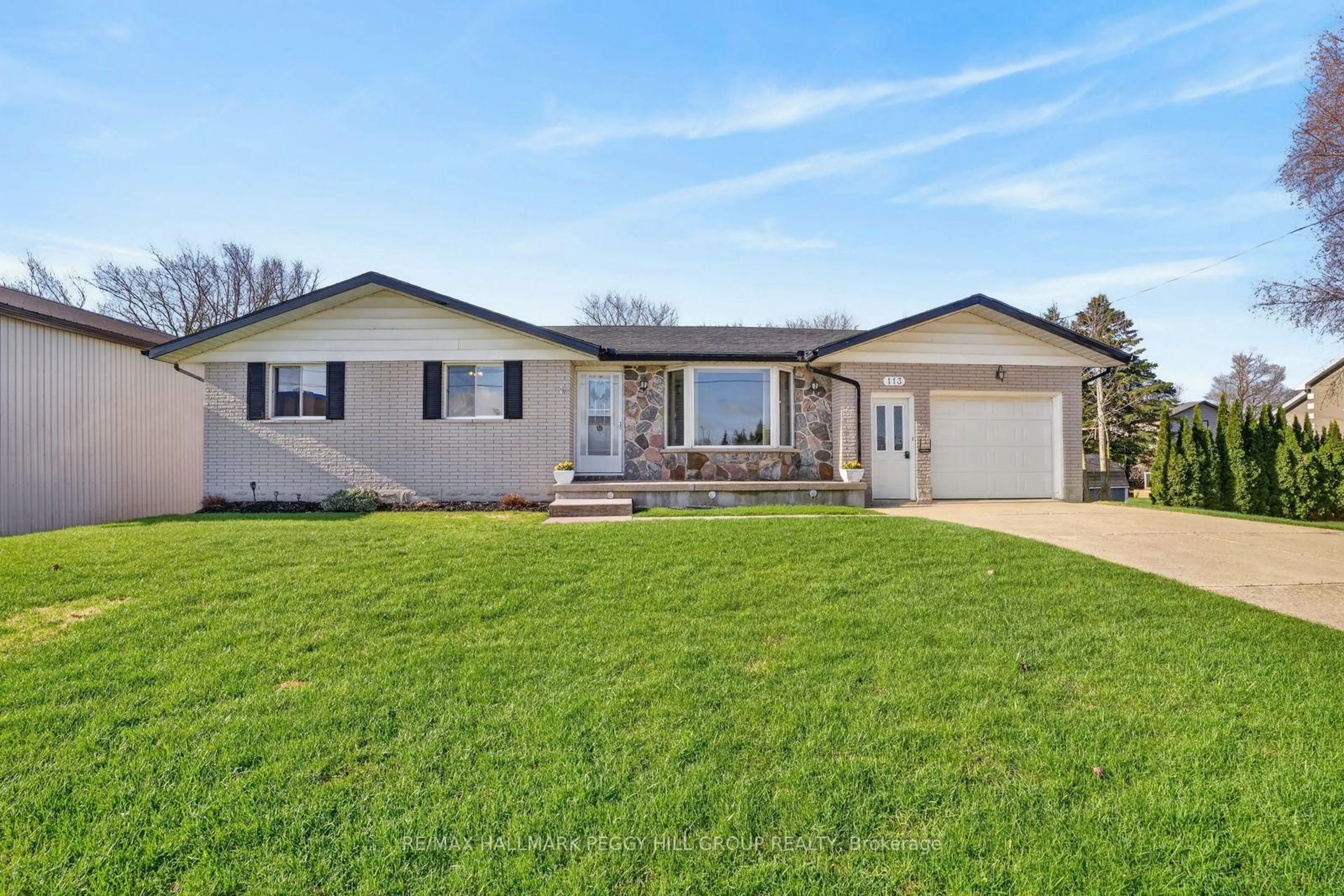 Home with vinyl exterior material, street for 113 Domville St, Wellington North Ontario N0G 1A0