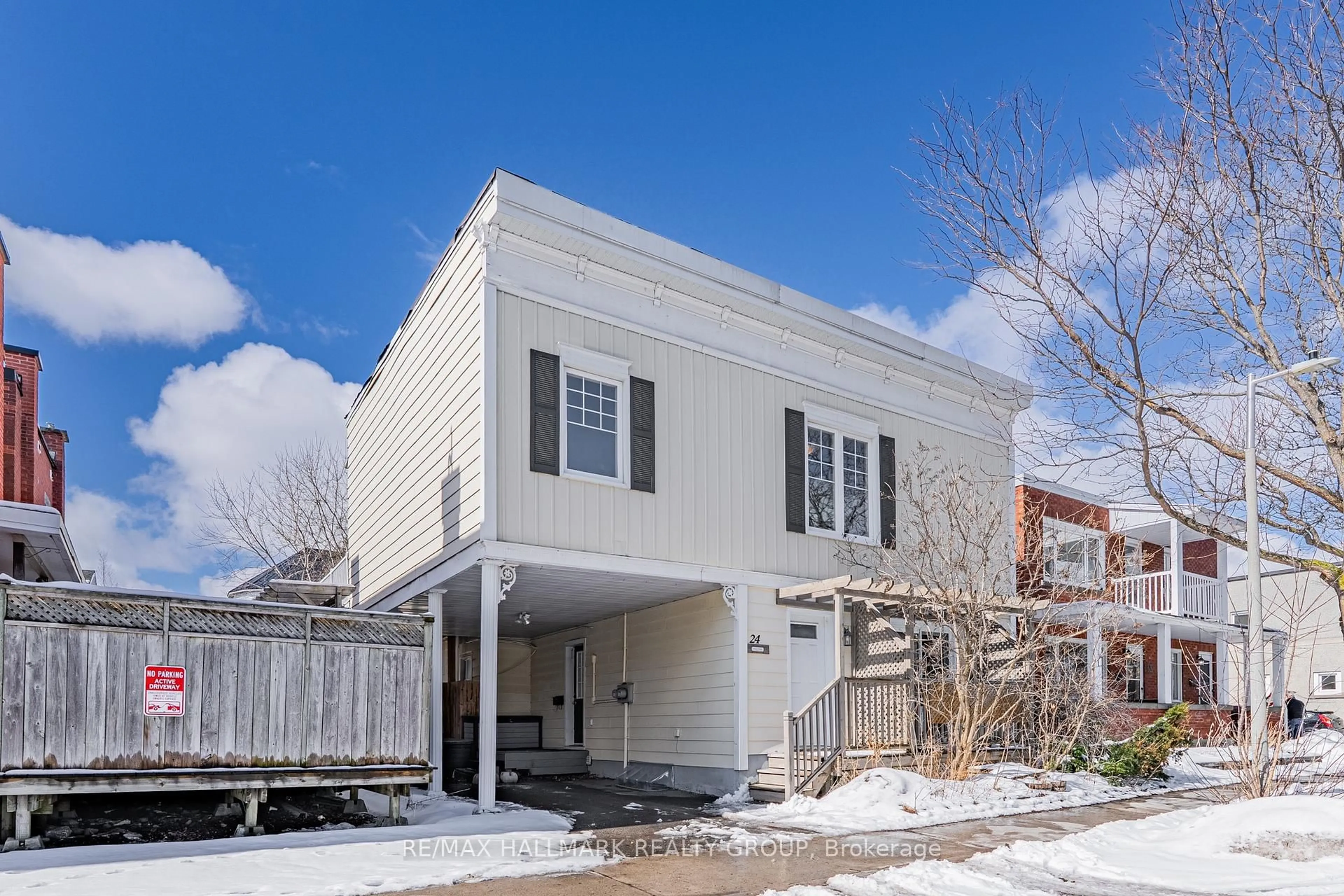 Home with vinyl exterior material, street for 24 Patro St, Ottawa Ontario K1N 8B1