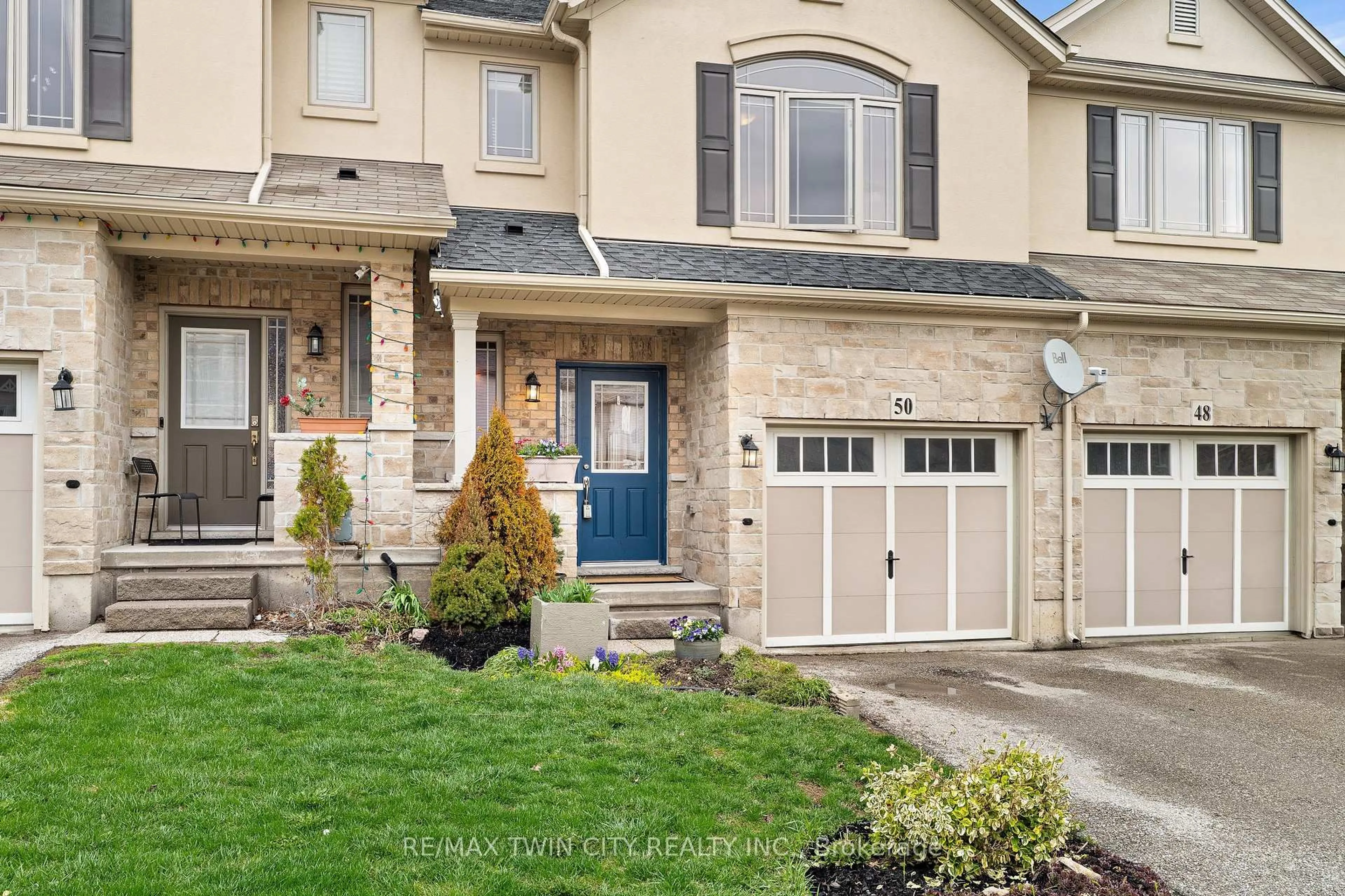 Home with brick exterior material, street for 50 Greenwater St, Kitchener Ontario N2R 0H2