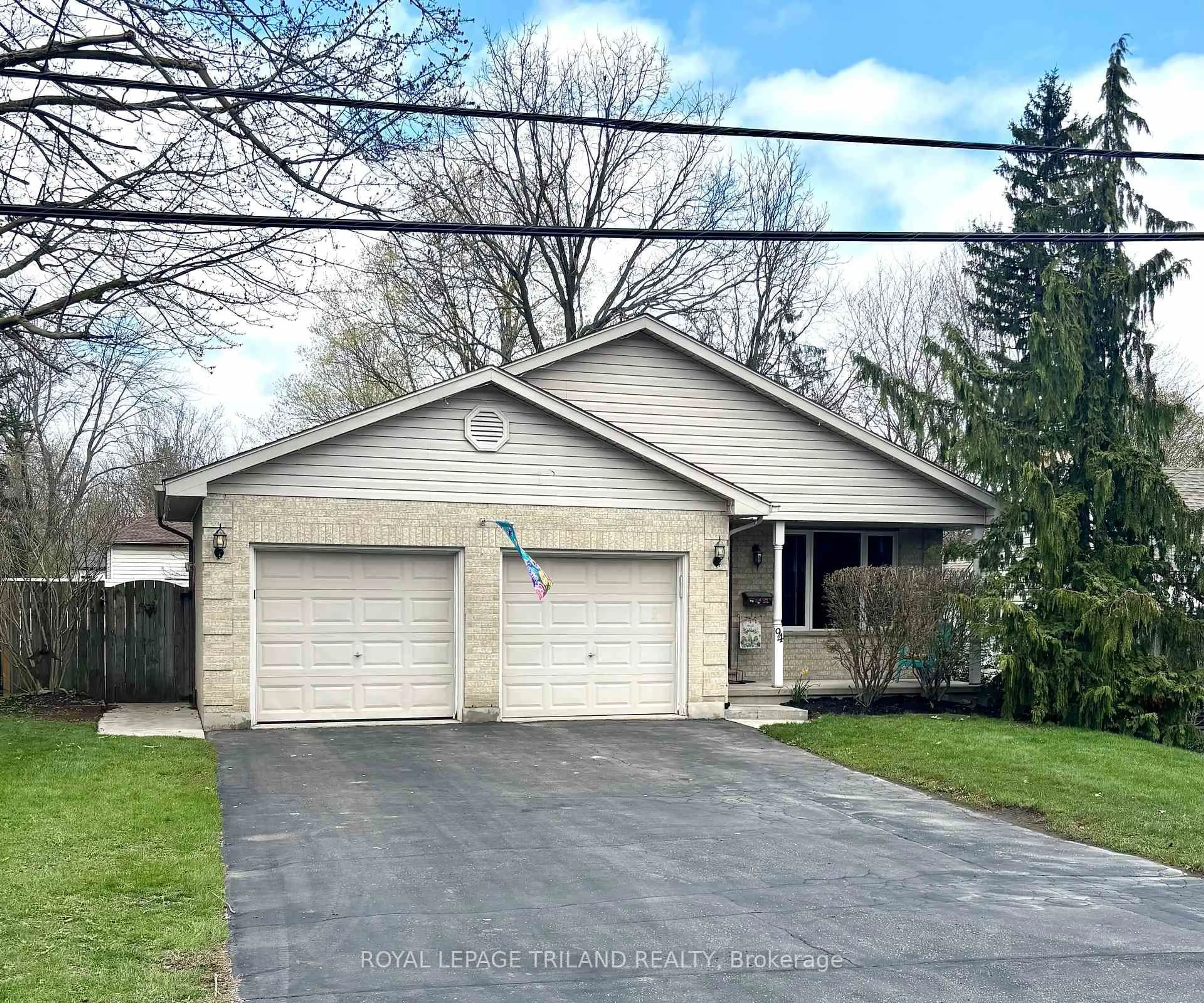 Home with vinyl exterior material, street for 94 Queen St, Thames Centre Ontario N0L 1G2