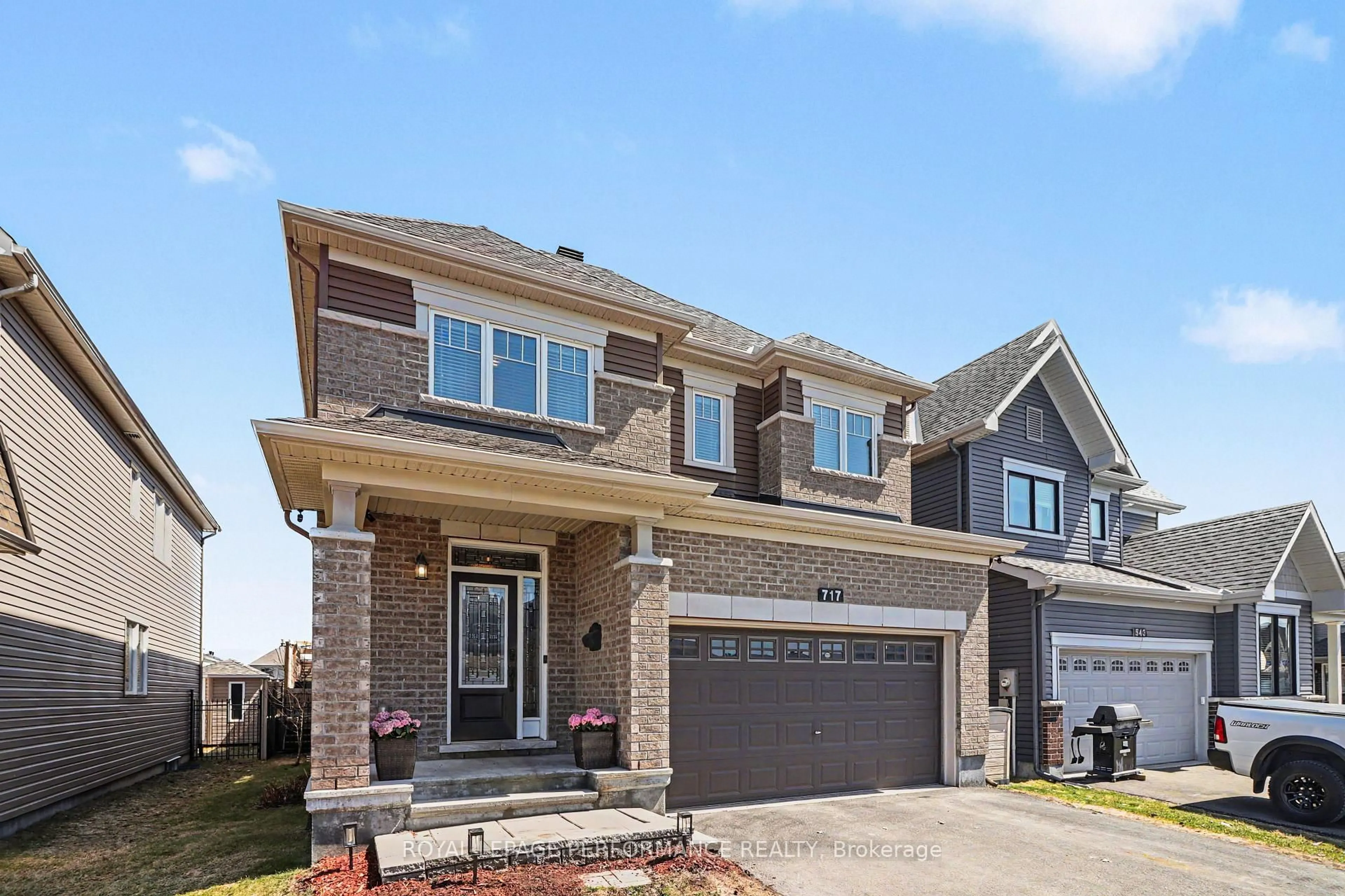 Home with brick exterior material, street for 717 Magnolia St, Ottawa Ontario K4A 0Z2