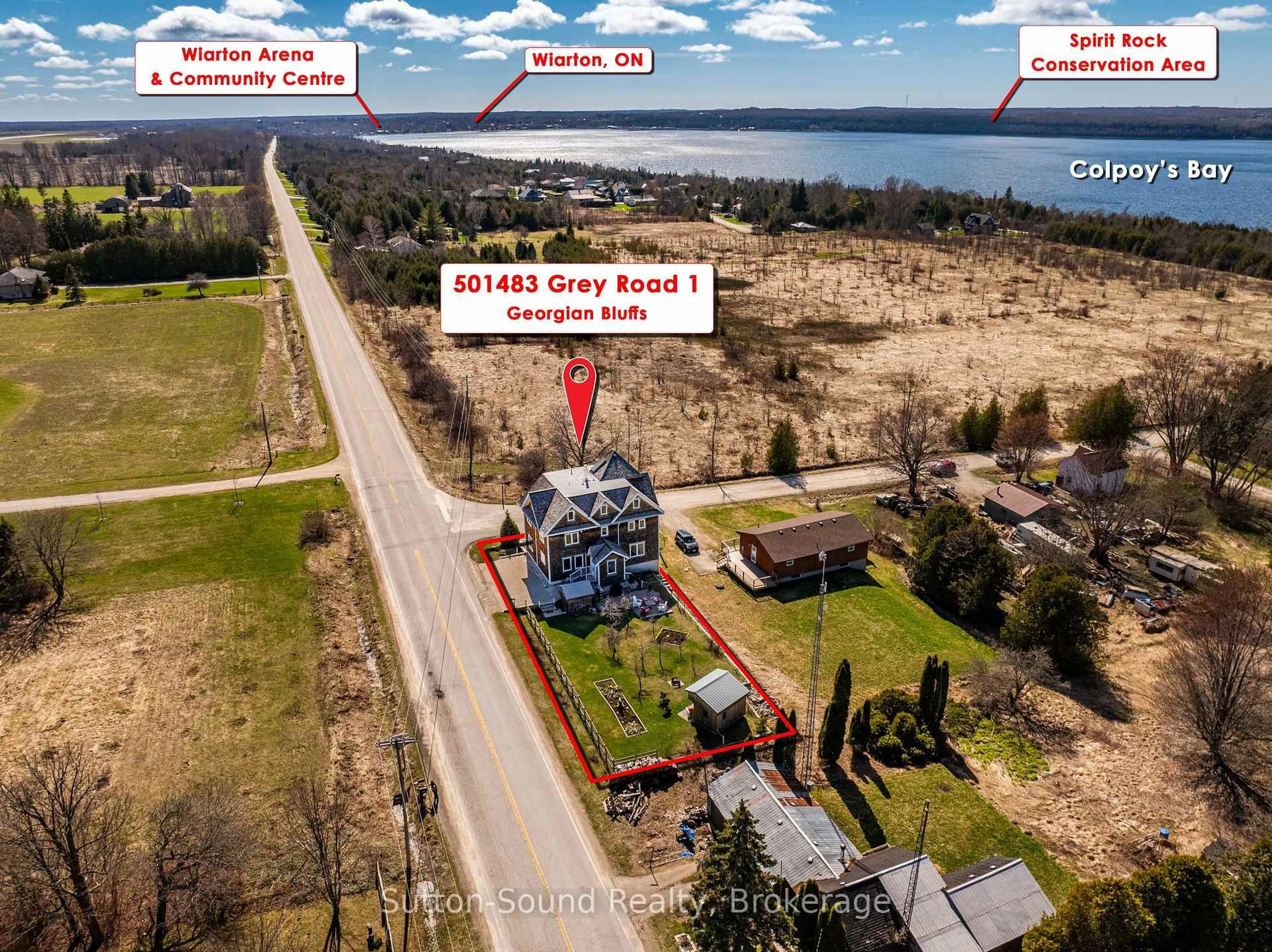 A pic from outside/outdoor area/front of a property/back of a property/a pic from drone, water/lake/river/ocean view for 501483 Grey Road 1 Rd, Georgian Bluffs Ontario N0H 2T0