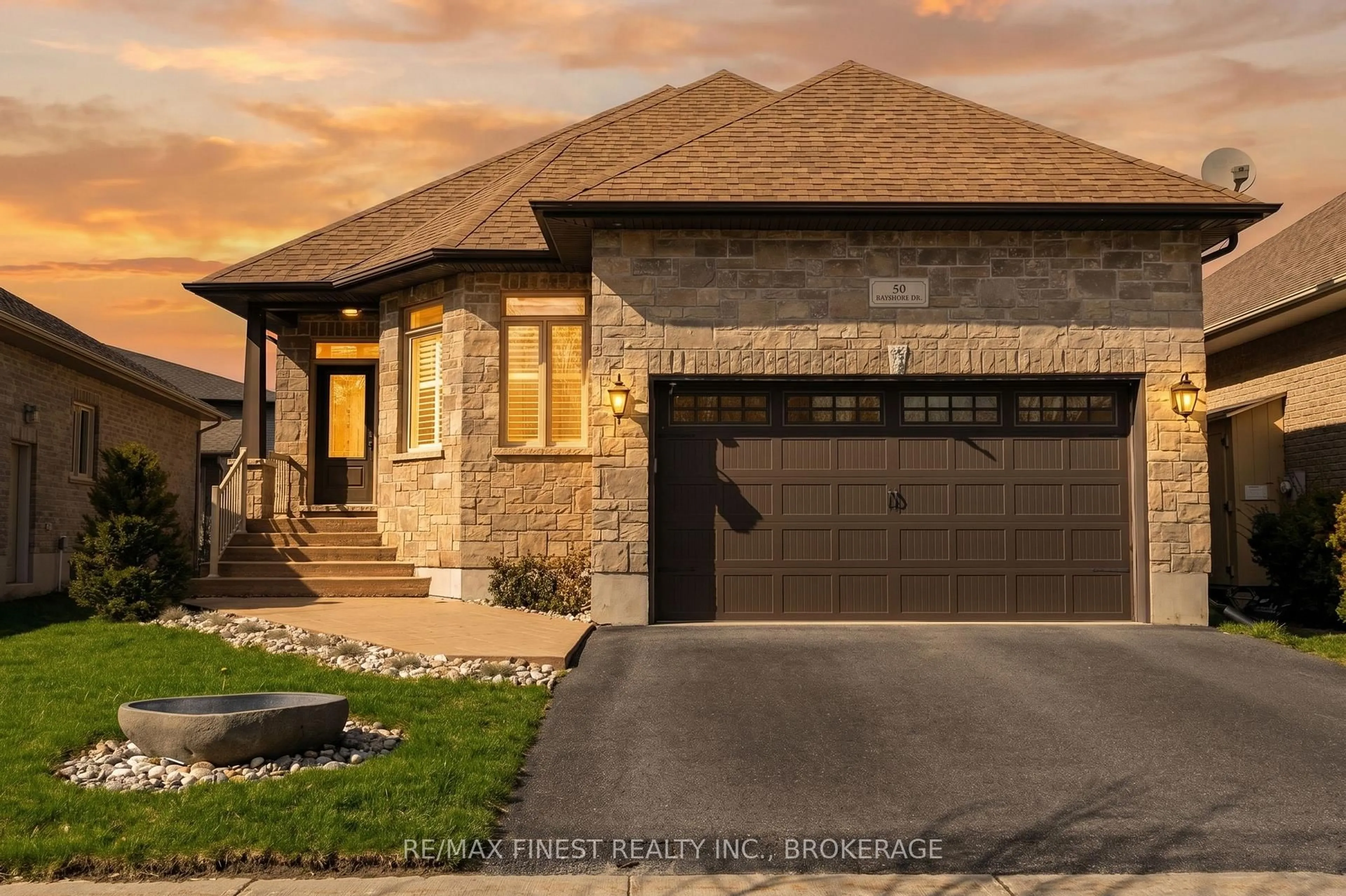 Home with brick exterior material, street for 50 Bayshore Dr, Bath Ontario K0H 1G0